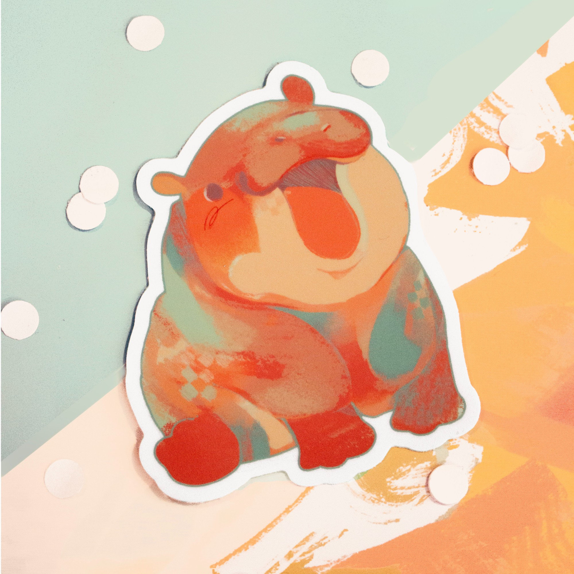 A vibrant, multi-coloured 3" hippo sticker, made out of a gloss vinyl material.