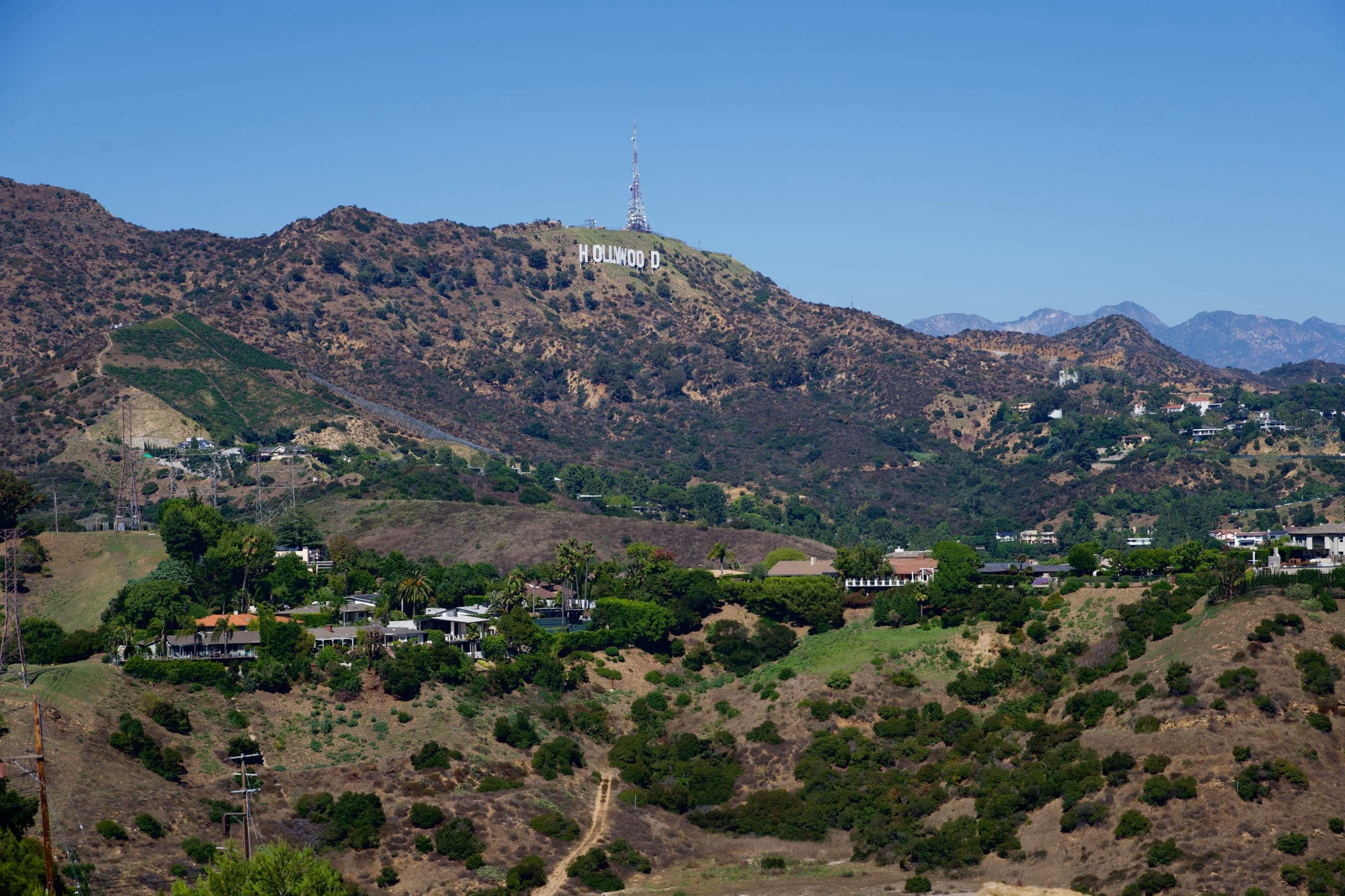 View of the Hollywood sign from a “Hollywood Tours” bus in Los Angeles, California