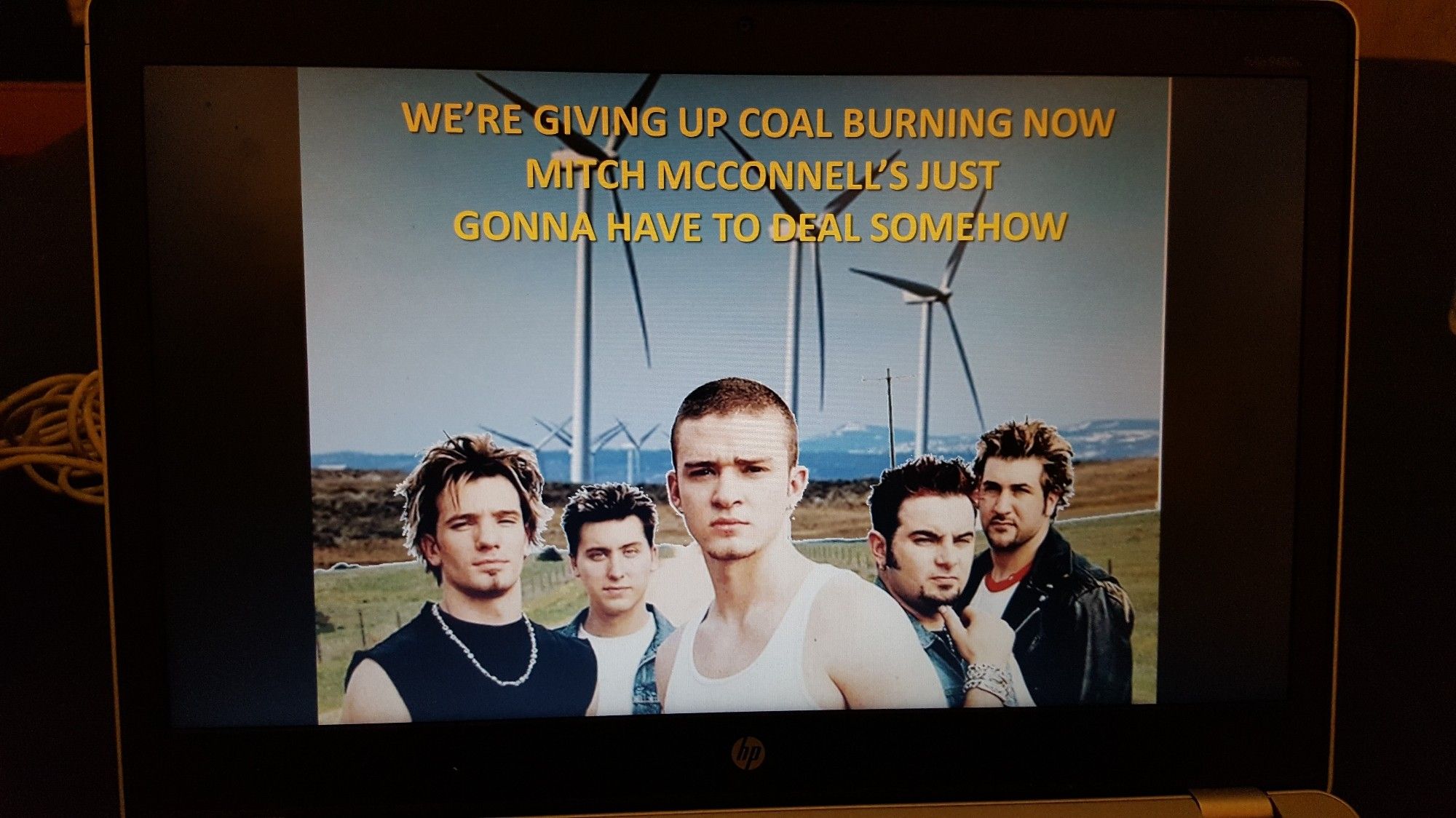 NSYNC in front of wind turbines with the lyrics "we're giving up coal burning now, Mitch McConnell's just gonna have to deal somehow"