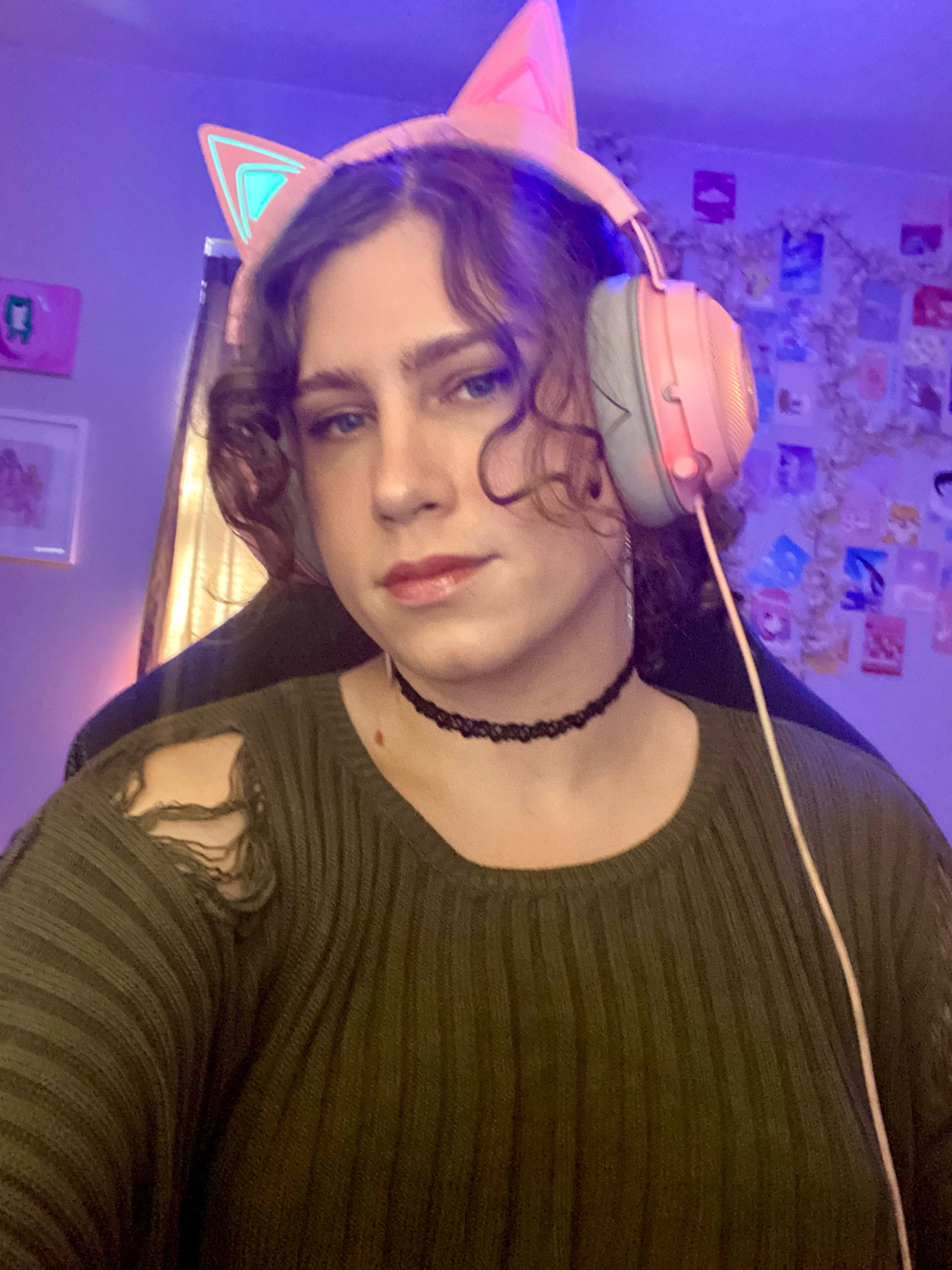 Me in my chair with my kitty headphones on and pretty rgb lighting 💖