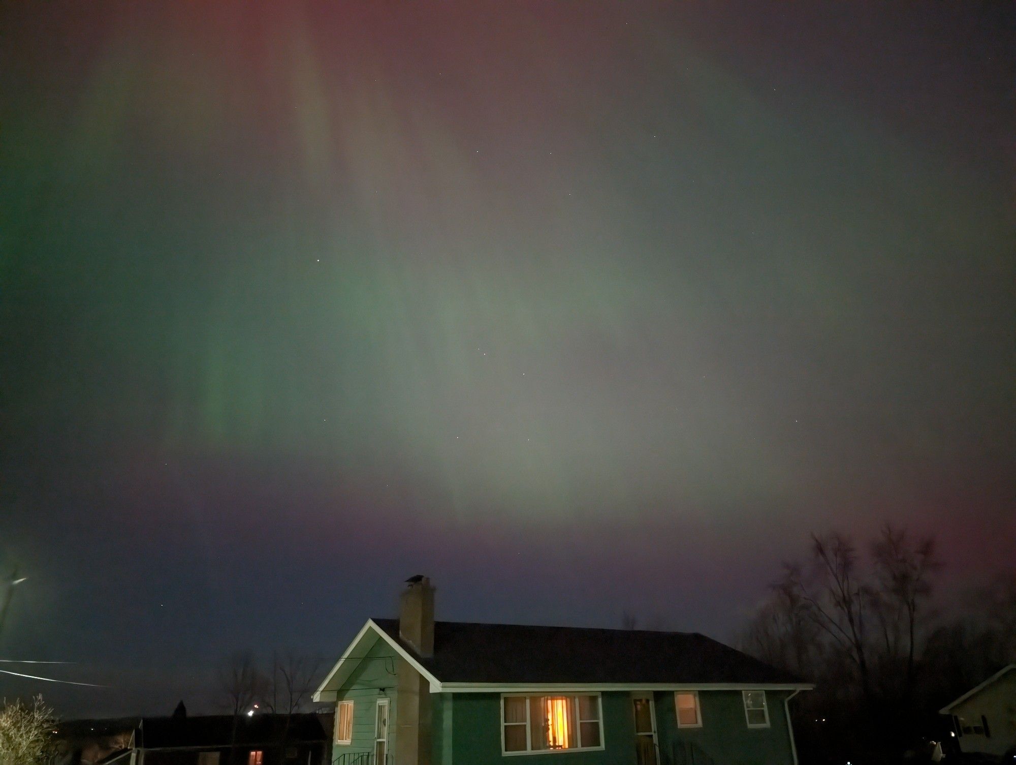 Northern lights over a home.