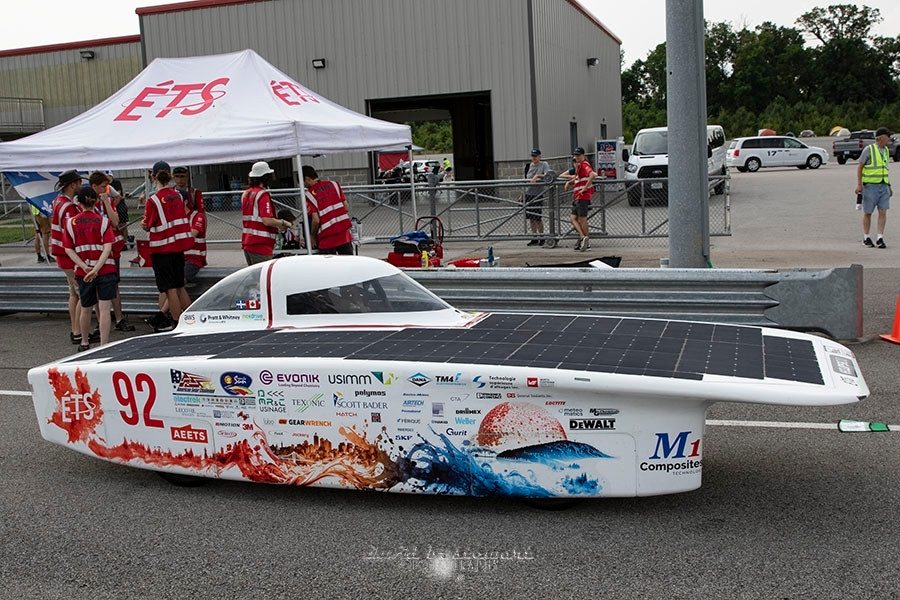 Title: La Fosse & La Voiture 📷

In pit lane, Montreal's ETS team patiently awaited  start of the first 8-hours of 24 Electrek Formula Sun Grand Prix. The ETS team seem to have been in the game for some time as they have one of the most beautiful and effective designs of the event. ETS was one of only a handful of teams actually making it on track for GP Day 1.

From a collection of photos taken at the 2024 Electrek Solar Challenge. NCM Motorsports Park, Bowling Green, KY USA.

#ThursdayVibe #originalcontent #solar #automobiles #shareyourparadise #canon #eos7dmkII #EF24-70mm