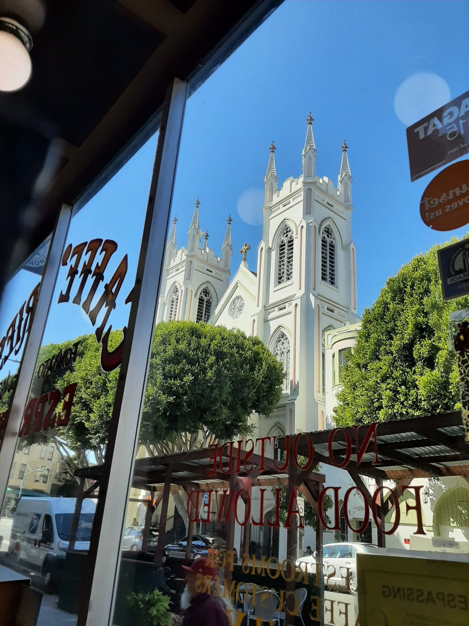 A view of a Catholic church outside the window of the cafe.