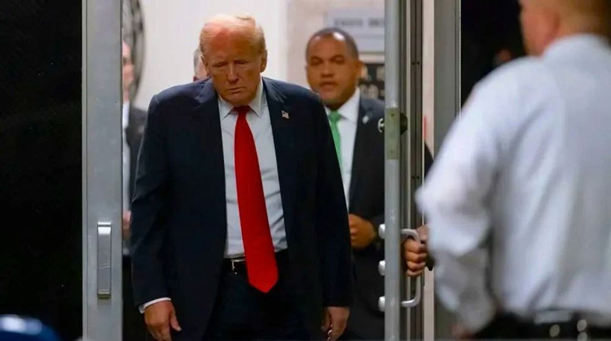 Picture of Trump leaving the court room a convicted felon, after being found guilty on 34 counts today.