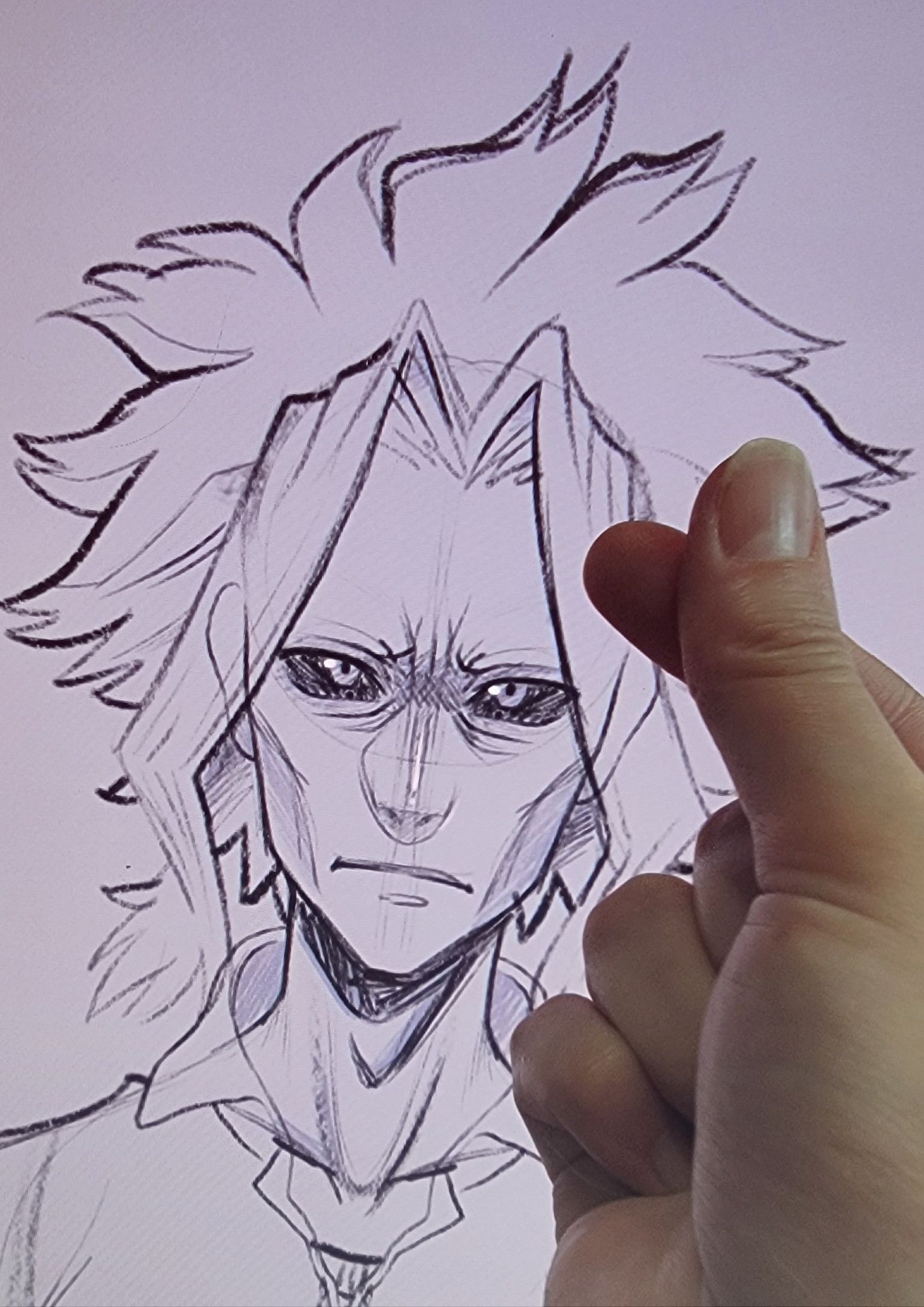 a hand using their pointer finger and thumb to make a heart shape at a sketch of SmallMight from My Hero Academia.