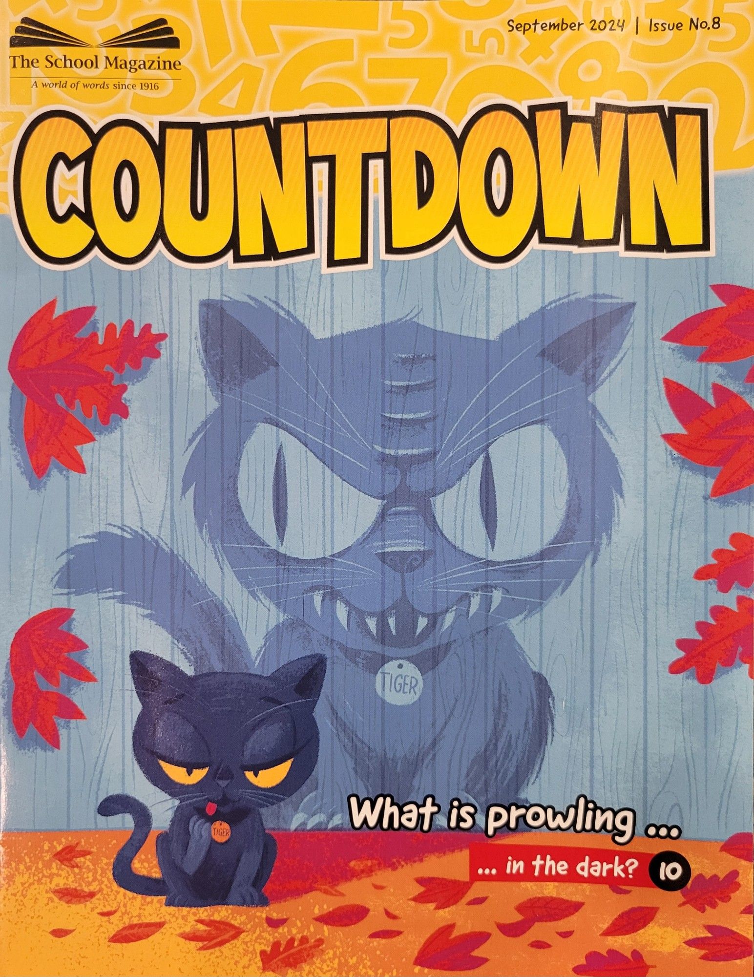 The cover of The School Magazine's Countdown September 2024 issue has a black cat calmly licking its paw in the foreground. The cat's shadow looks menacing with sharp teeth and large scary eyes. "What is prowling...in the dark?" is listed on page 10.