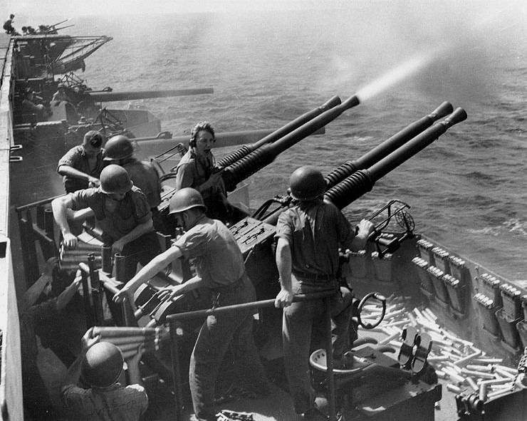 Mk.12 Quad 40mm Bofors firing aboard the USS Hornet (CV-12), February, 1945.