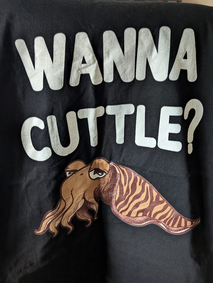 cuttlefish cartoon shirt, captioned "Wanna Cuttle?"