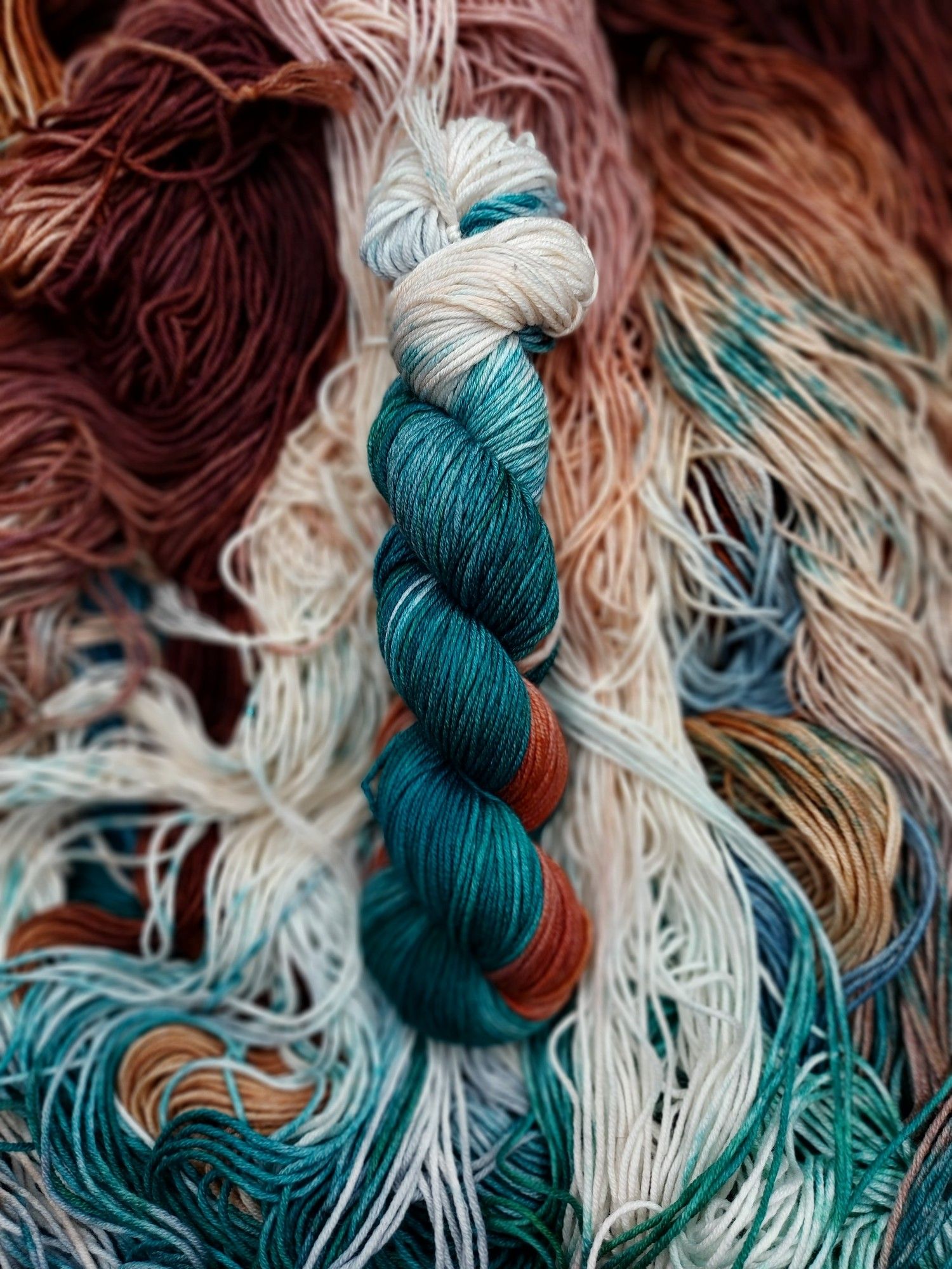 Teal and brown yarn.