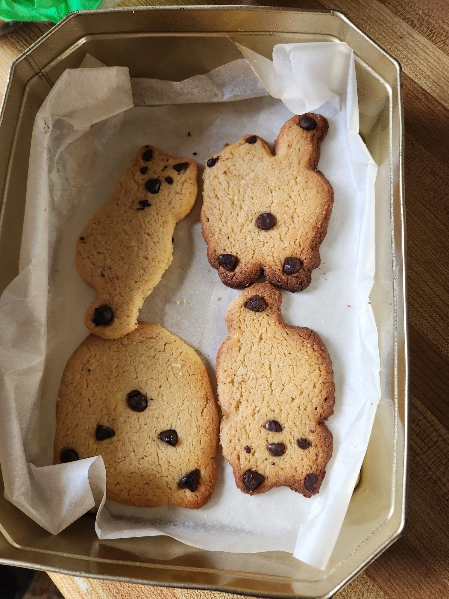 Some of the cat sugar cookies my dad made, chocolate chips used for detail, like one as a butthole