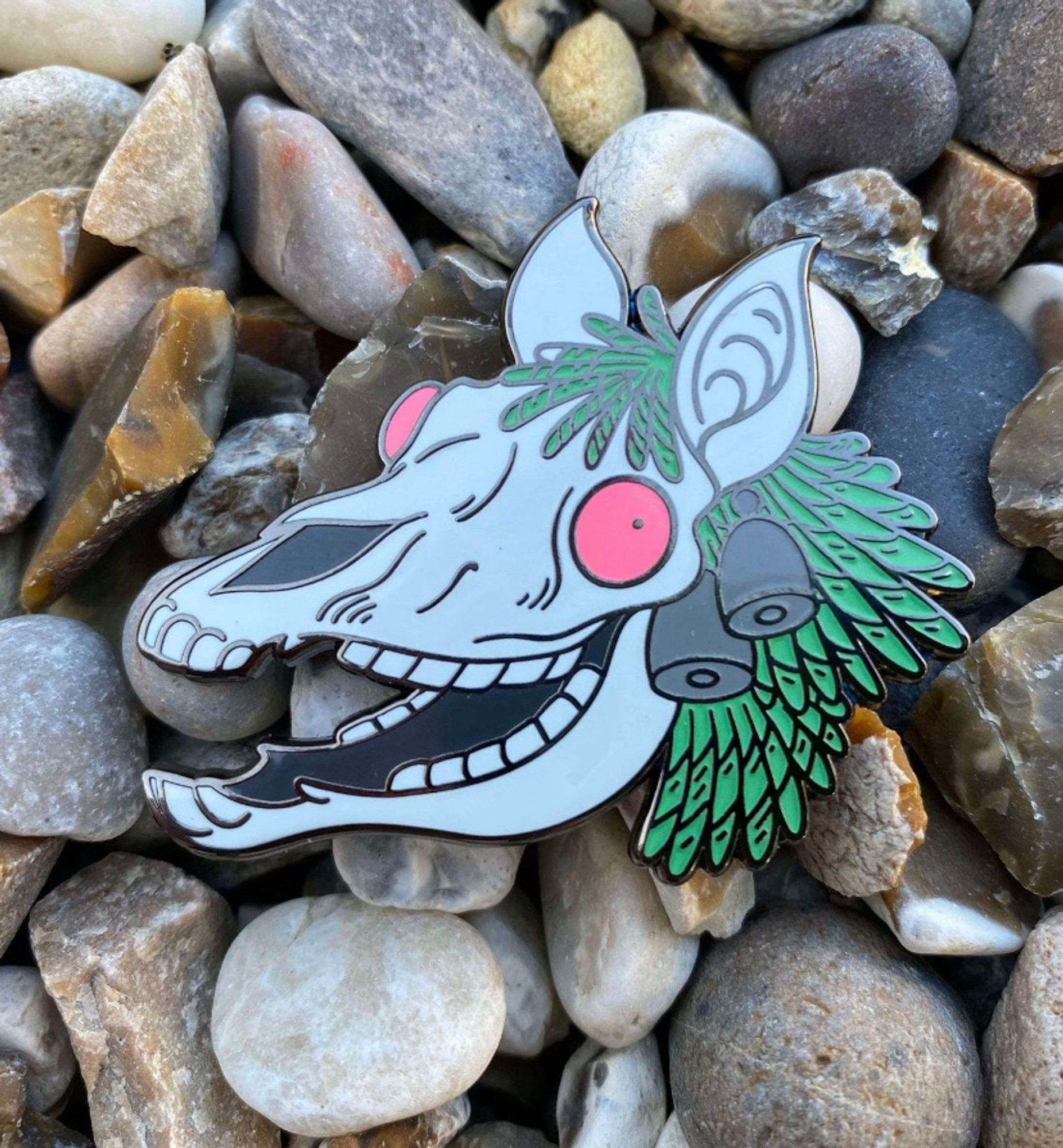 A goofy looking horse skull with green hair and bright pink eyes