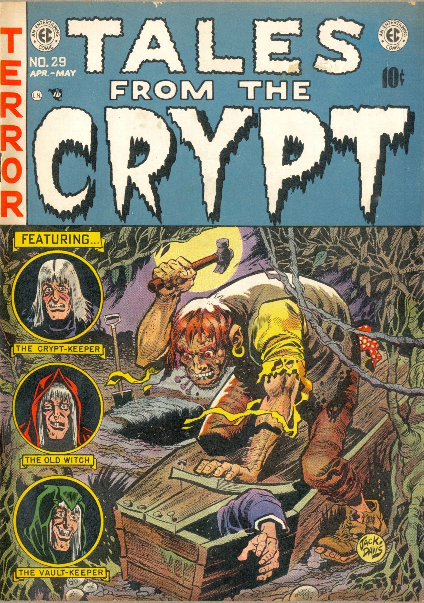 Tales from the Crypt #29 (1952). On the cover, a disfigured man is hammering a coffin closed near an open grave. An arm can be seen protruding from the last open part of the coffin.