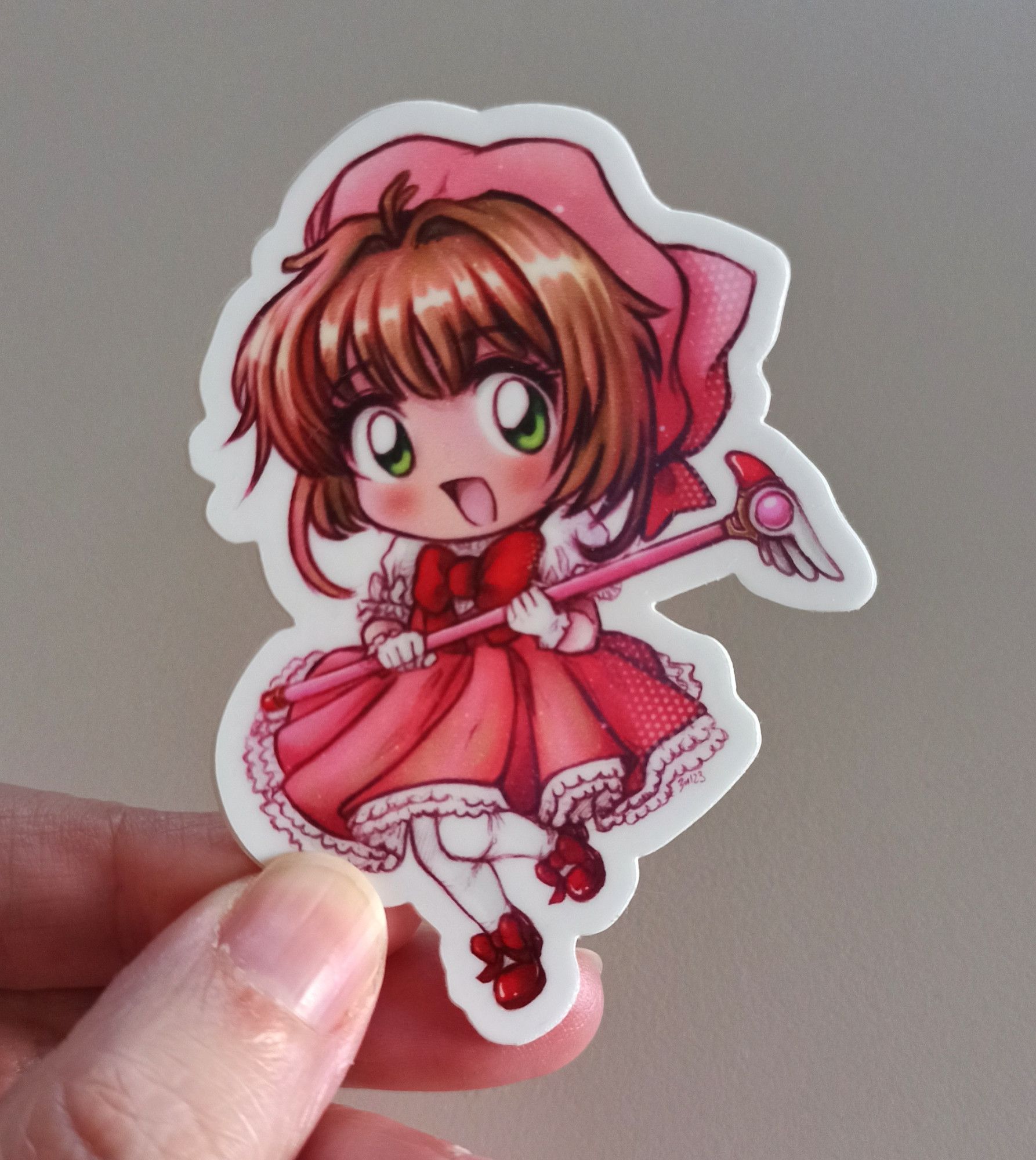 Foto de un sticker de Sakura Kinomoto en versión chibi dibujada por mí ♥