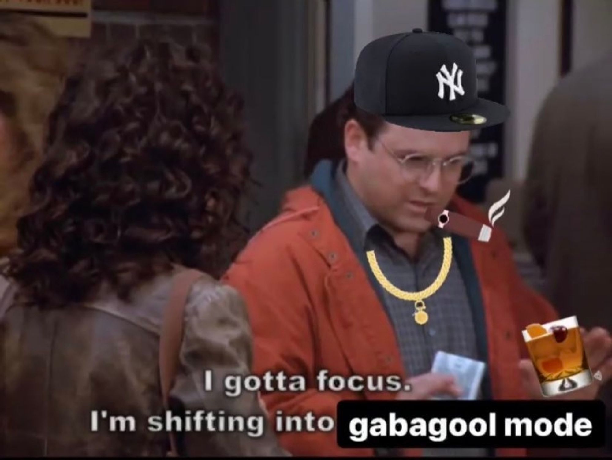 George Costanza, wearing a gold chain and a Yankees hat, smoking a cigar, saying "I gotta focus, I'm shifting into gabagool mode."