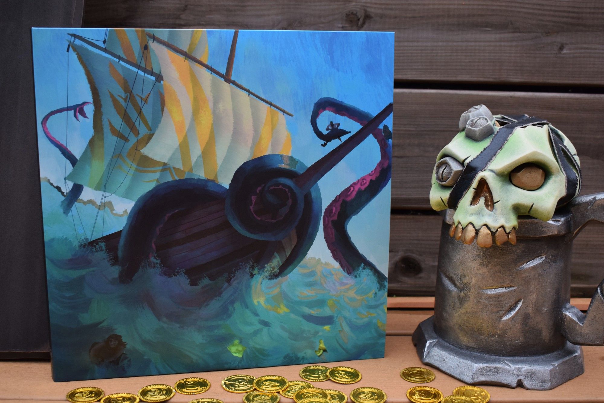 A skull sits on a tankard next to the gorgeous Sea of Thieves Vinyl Soundtrack.