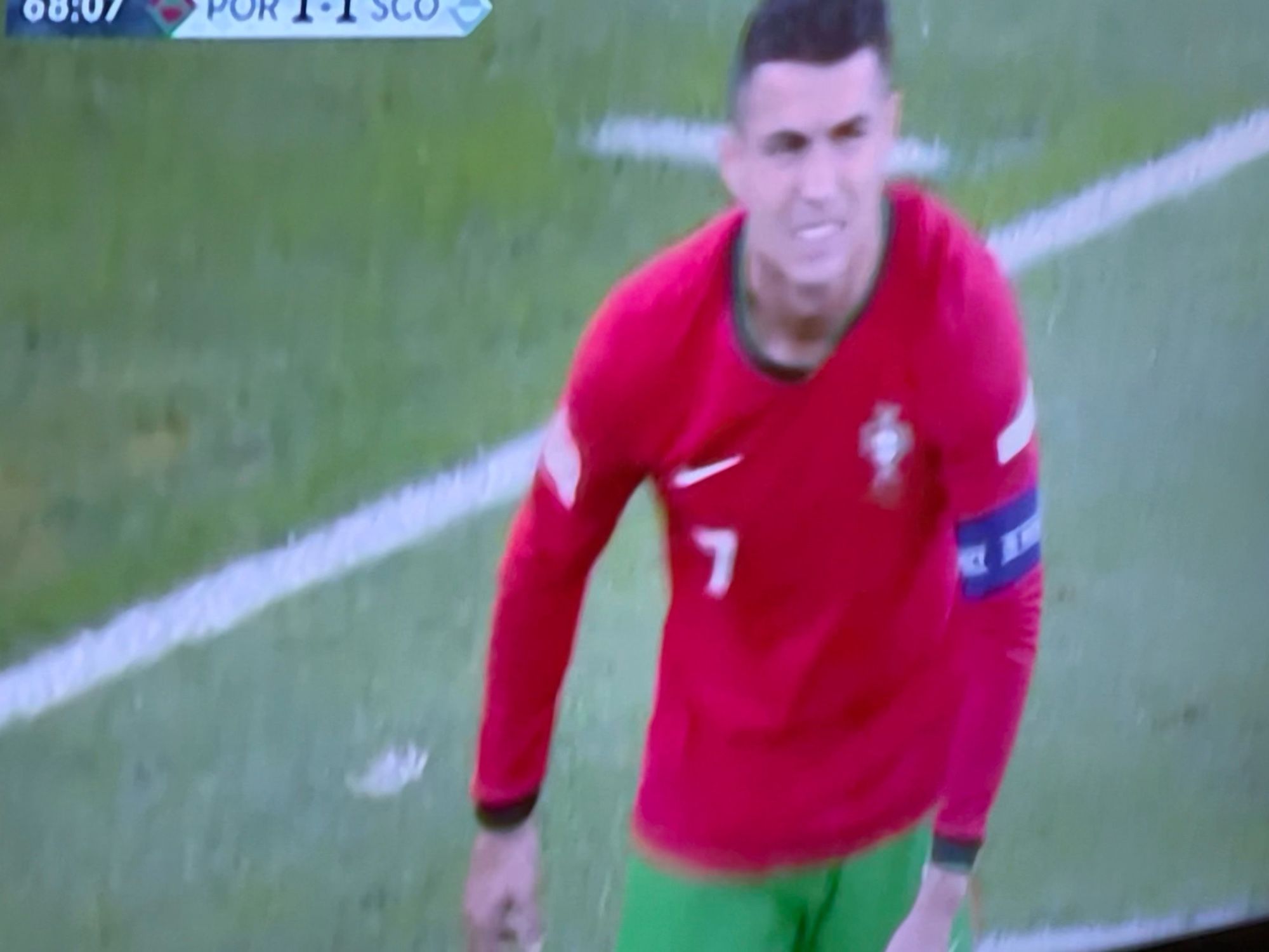 Ronaldo (who is banned from ever again entering the USA) grimaces after being made to look like the prat he truly is, at the hands of Mr. Ryan Christie.