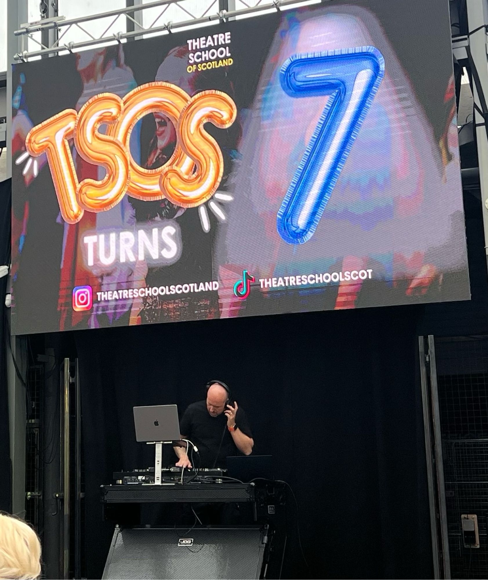 A DJ who looks a bit like Jason Statham spinning the discs at the 7th birthday party of the Theatre School of Scotland in BAaD, Glasgow.