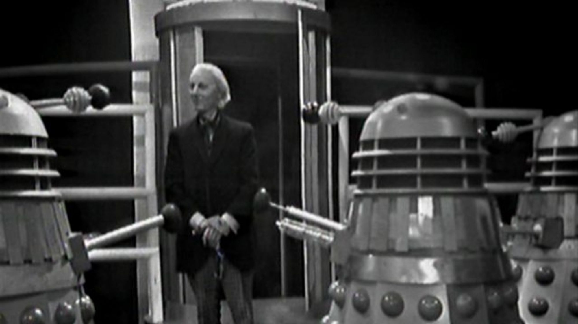 The first Doctor surrounded by Daleks