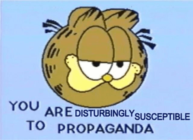 A Garfield poster with a blue background it's just his head and says "You are Disturbingly Susceptible to Propaganda" 