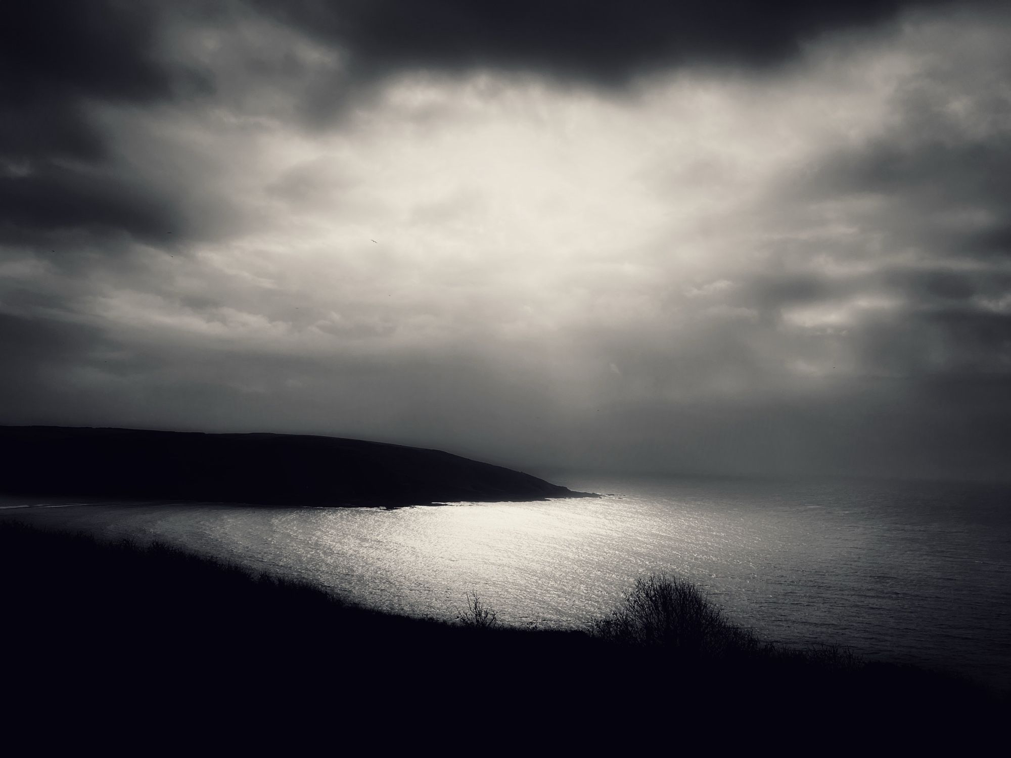 B&W headland with silver sea