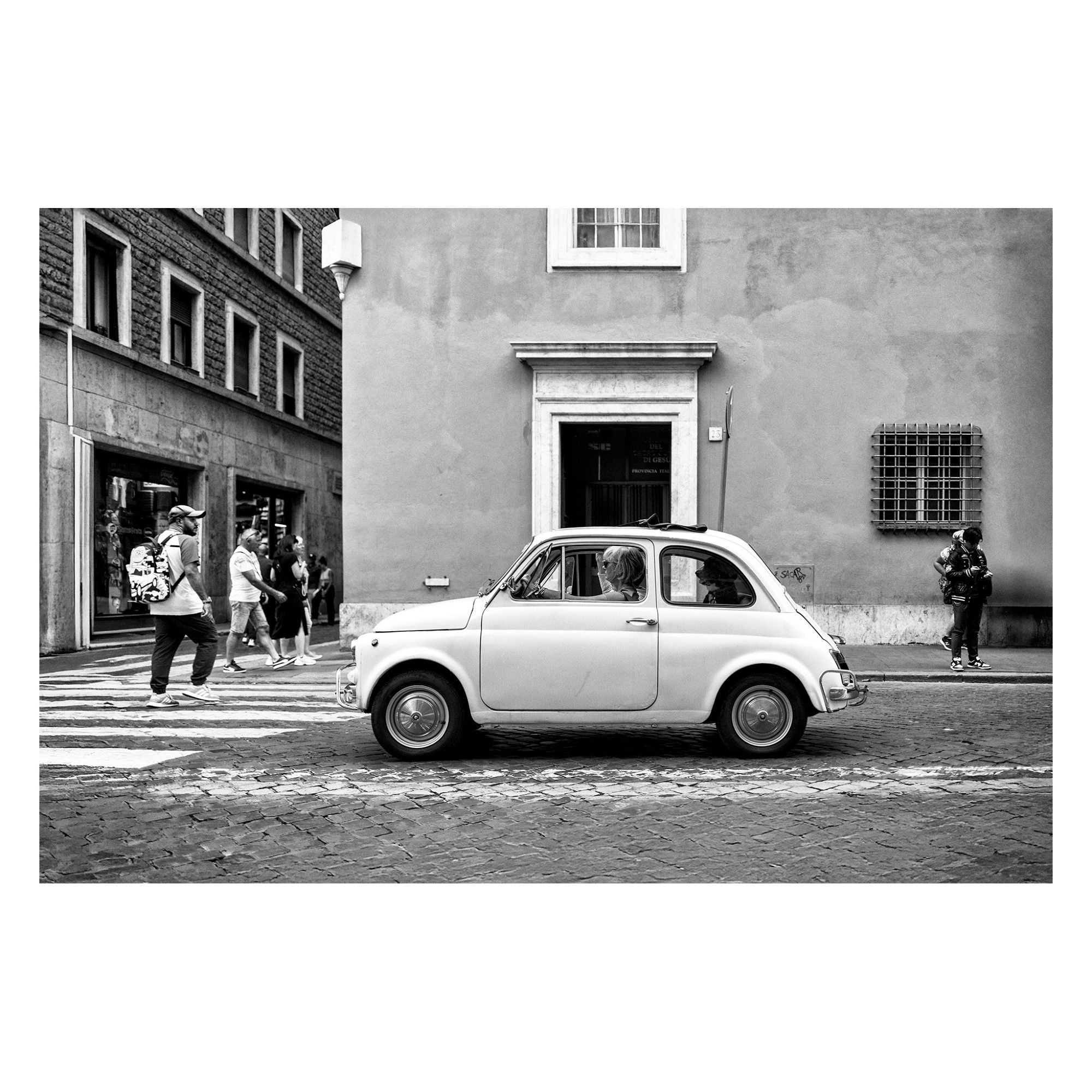 original fiat 500 in the street of roma, balck and white