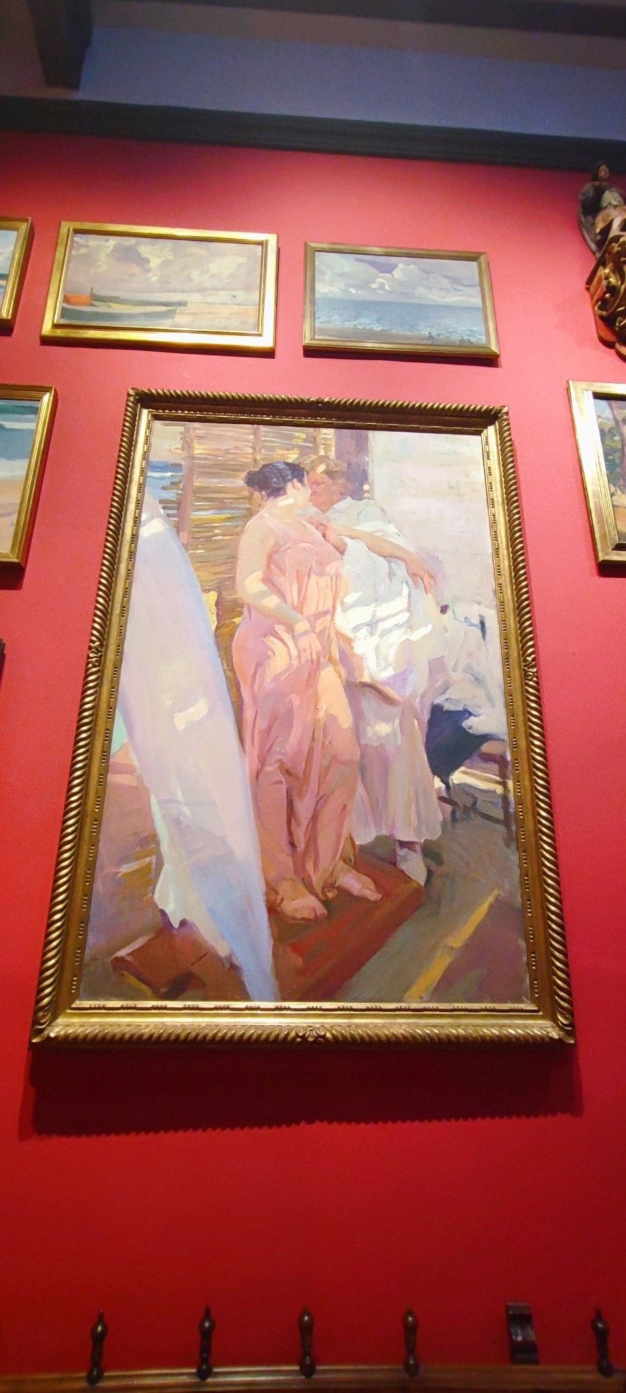 La bata rosa (Sorolla, 1916).