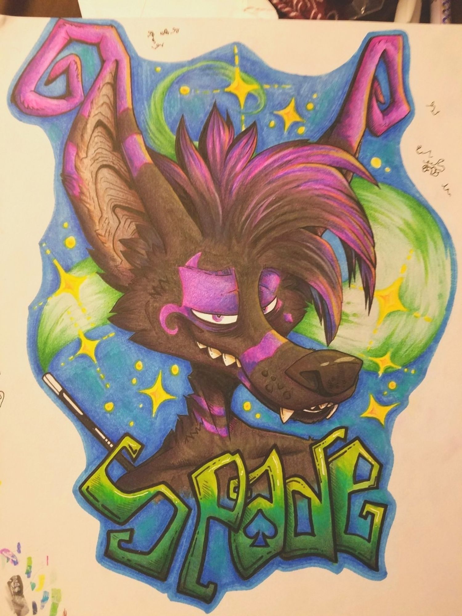 A black & purple crux with a magic wand & sparkles. Badge reads "Spade"