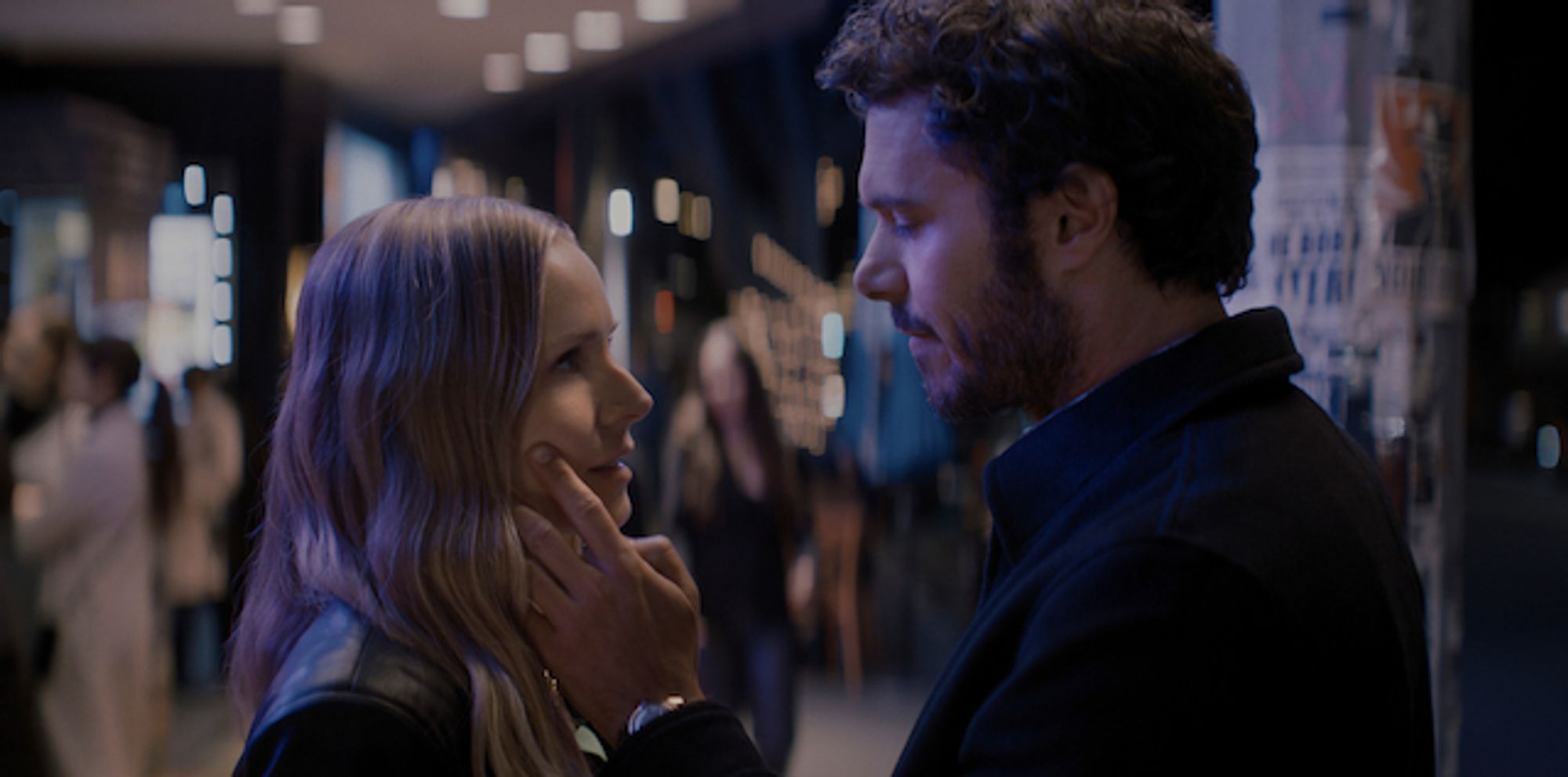 Adam Brody cradles Kristen Bell's face in a promotional photo for the show NOBODY WANTS THIS. I am in this show. I like the title but i'm making sure that reviewers can't make a hacky lil joke if they don't like it.