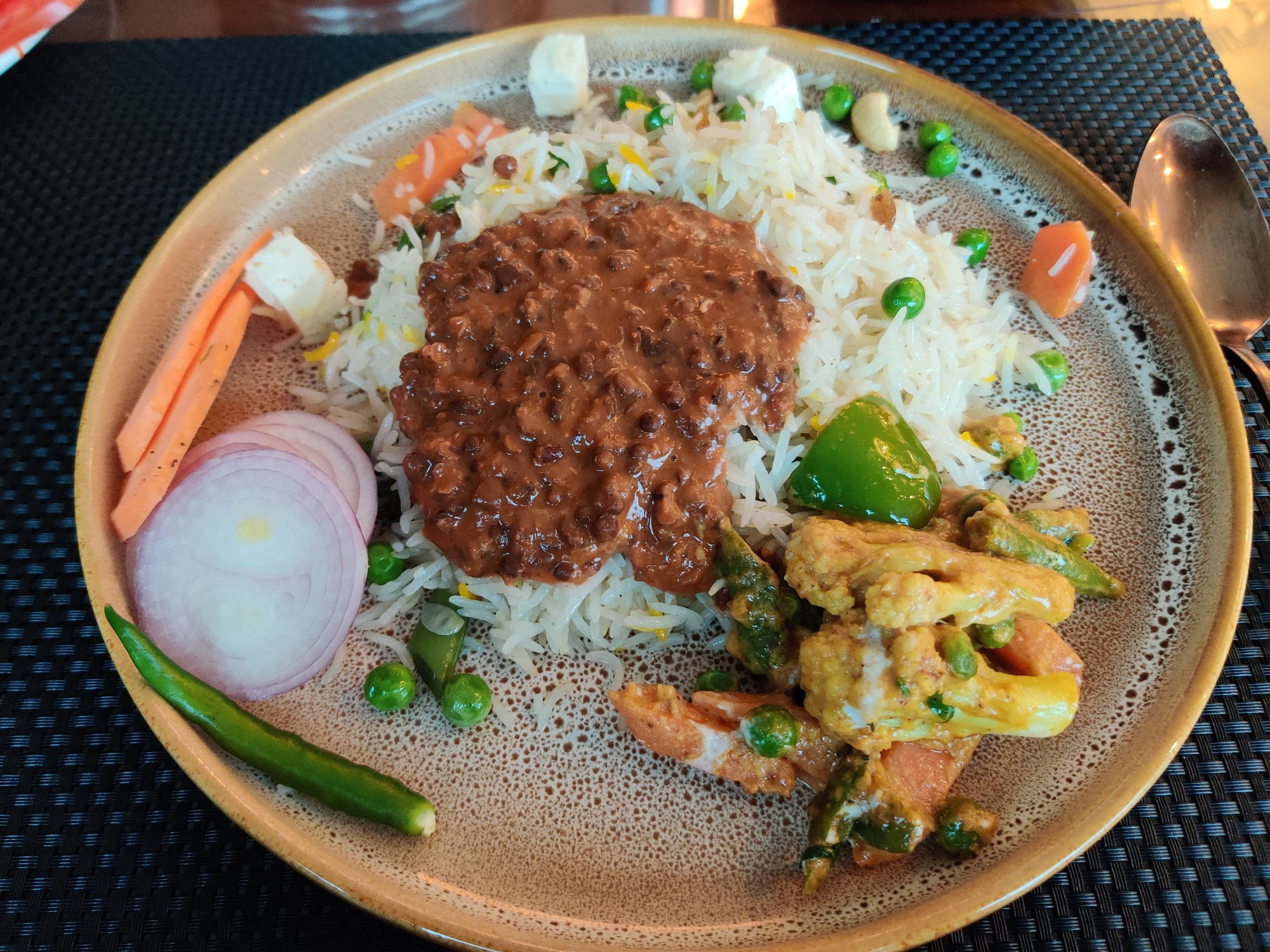 Veg pulao and dal makhani along with mix veg and green salad