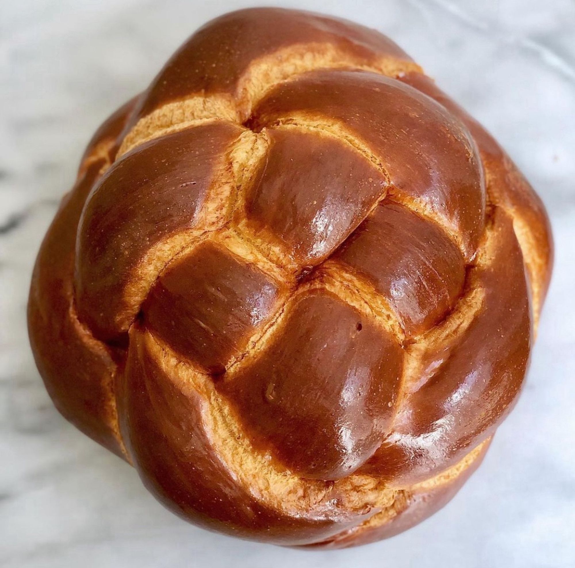 Round braided loaf of bread