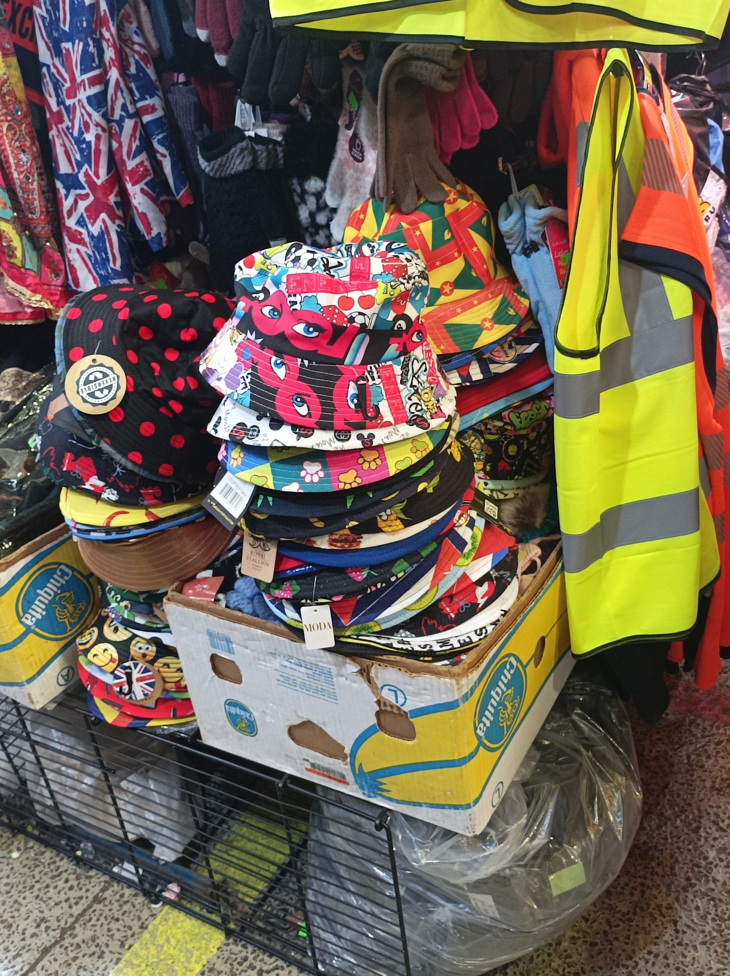 Stacks of Bucket hats on a market stall