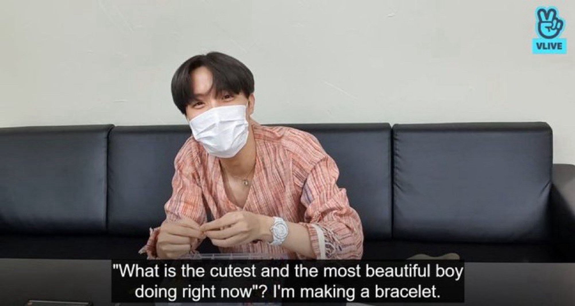 the cutest and most beautiful boy, jhope of BTS, making bracelets in a vlive