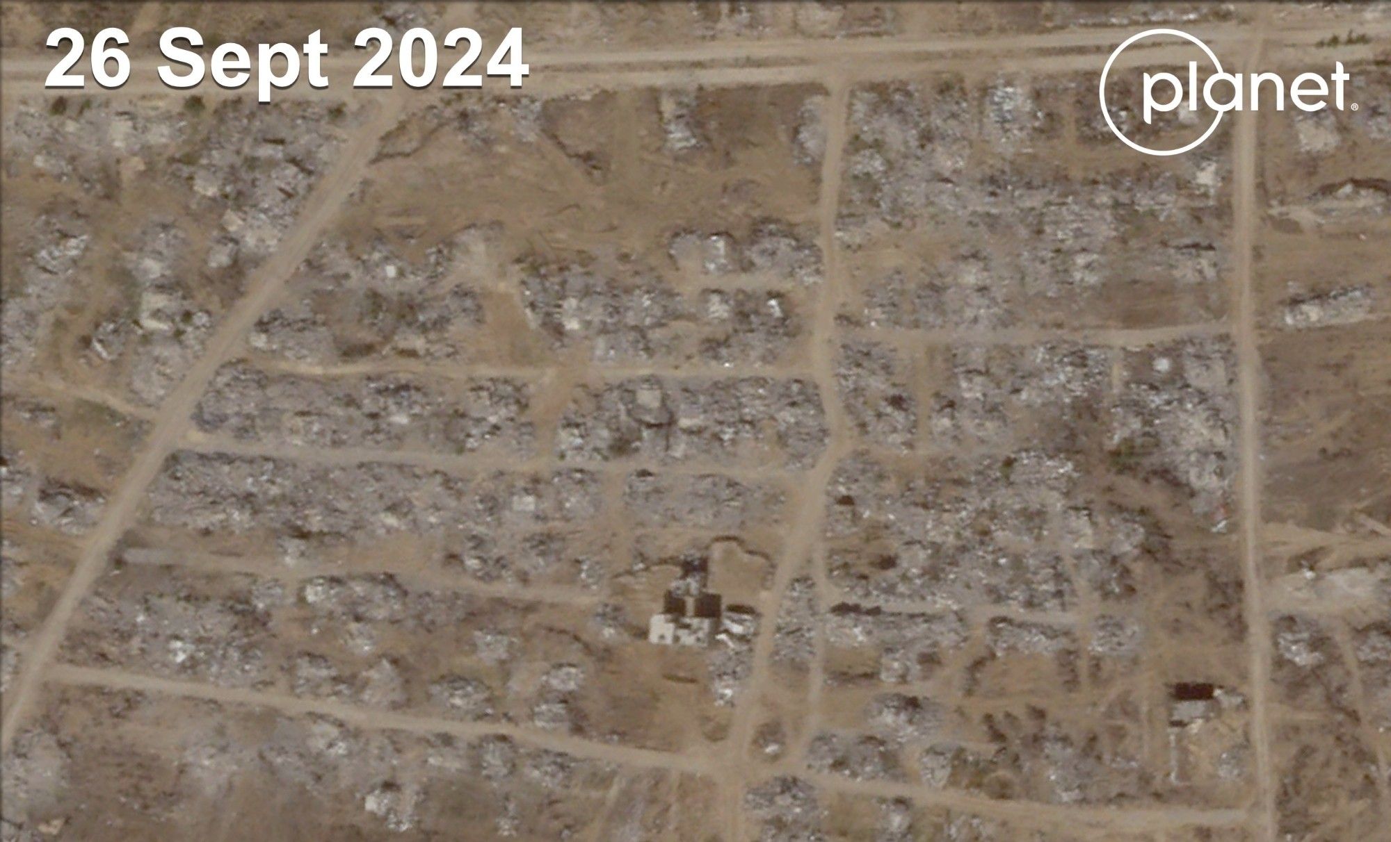 Image of south of Gaza City, 2024, showing all areas bombed out and razed to the ground.