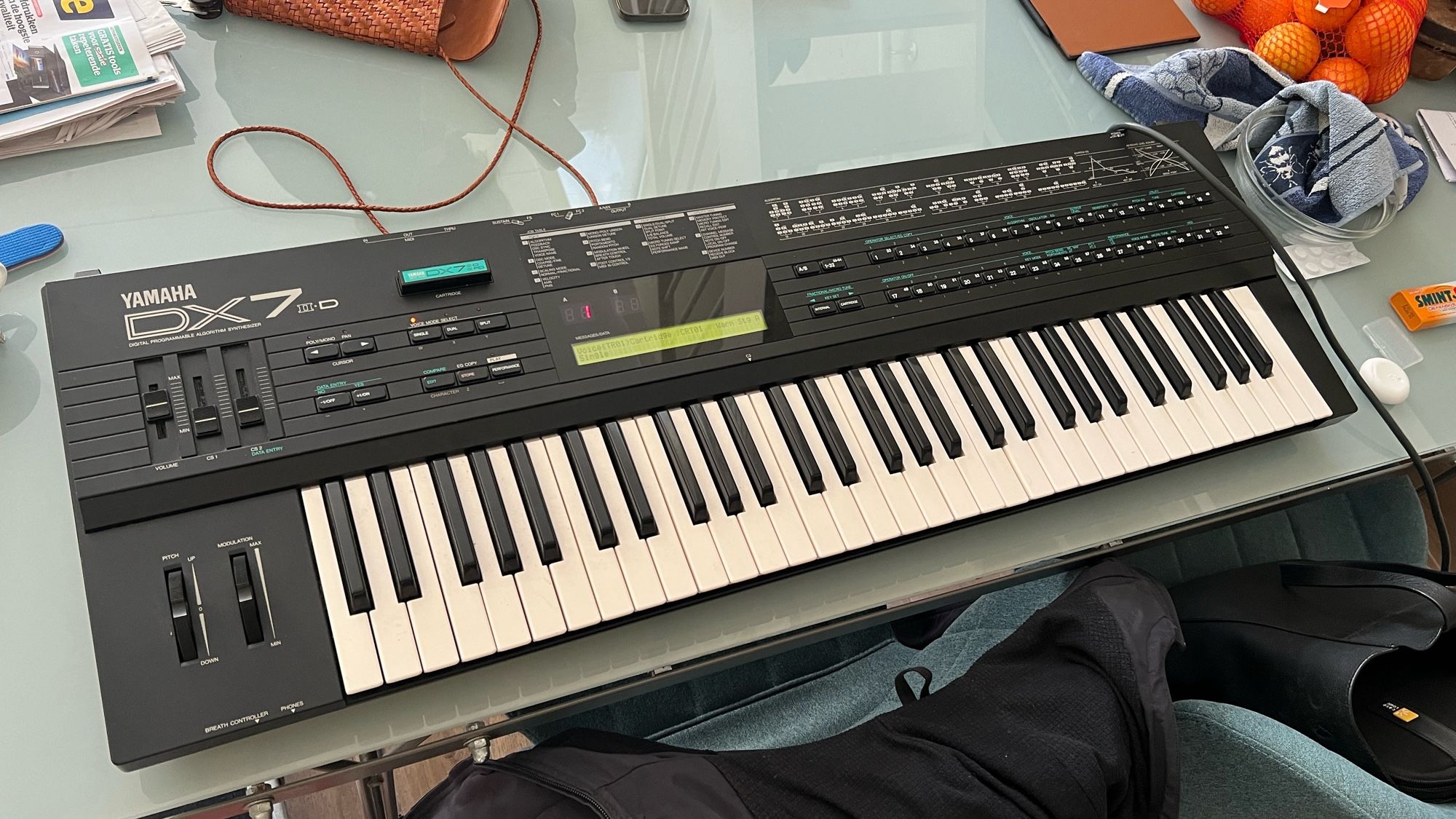 Photo of a Yamaha DX7-IID synthesizer, from 1987 with E! grey matter expansion board.