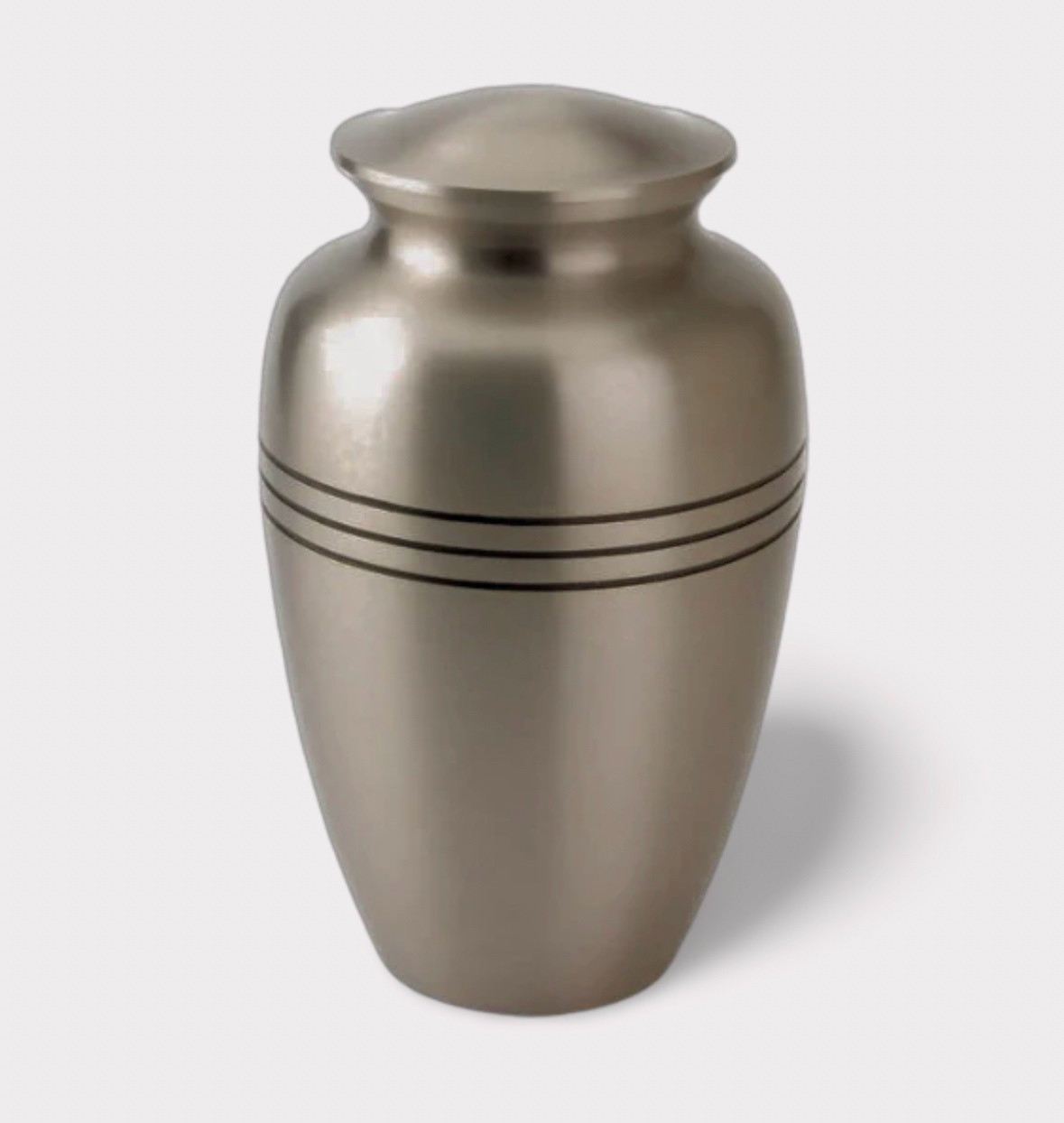 A bronze coloured urn as typically used for deceased cremated ashes. 