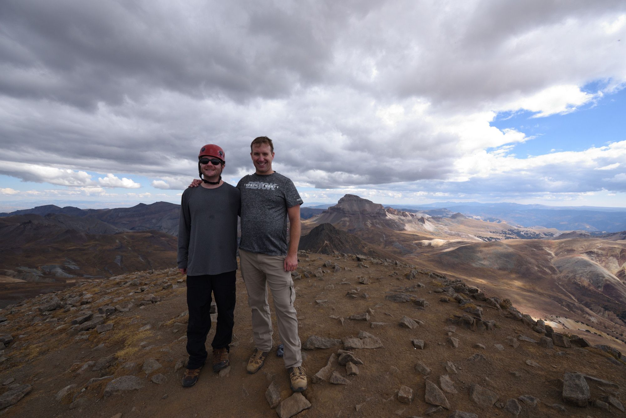 Noah and I at the summit of Wetterhorn Peak with Uncompahgre Peak (tallest of the San Juans) photobombing behind us.