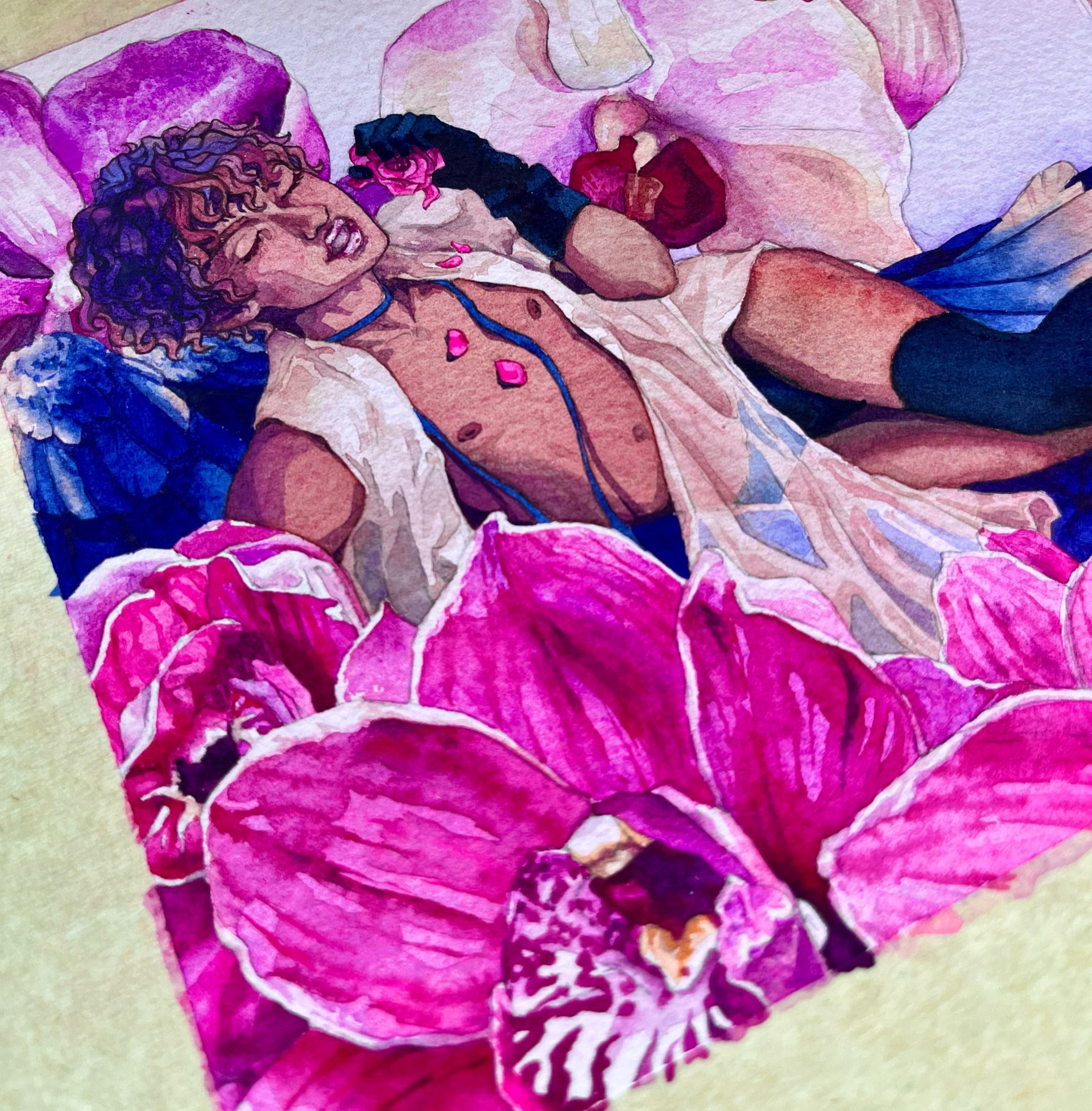 A work in progress watercolor painting of a masculine figure with brown skin in a tender pose with bright pink orchid flowers around him. A translucent pink robe rests over him, and he also has dark blue wings. 