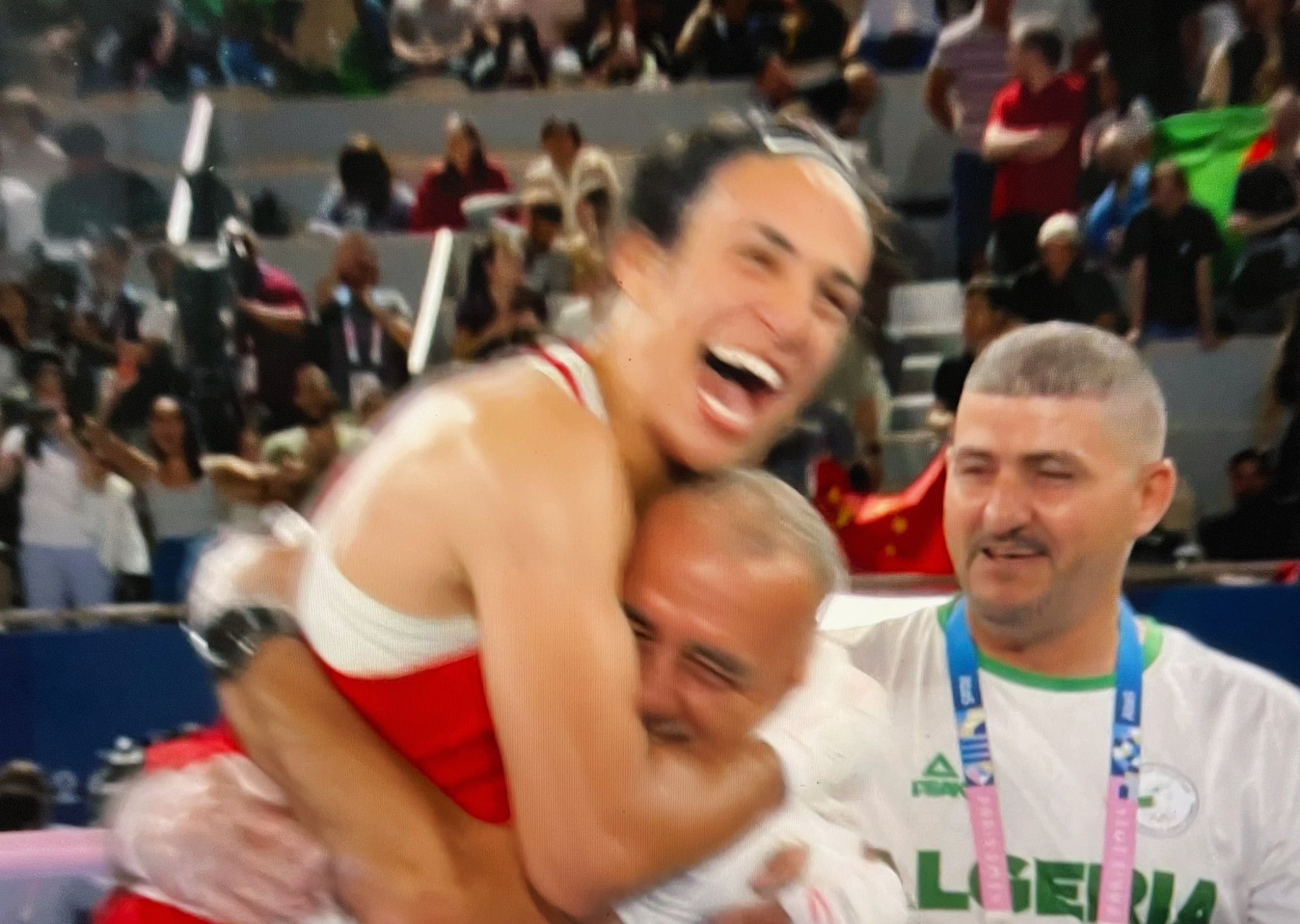 Imane embracing her coach