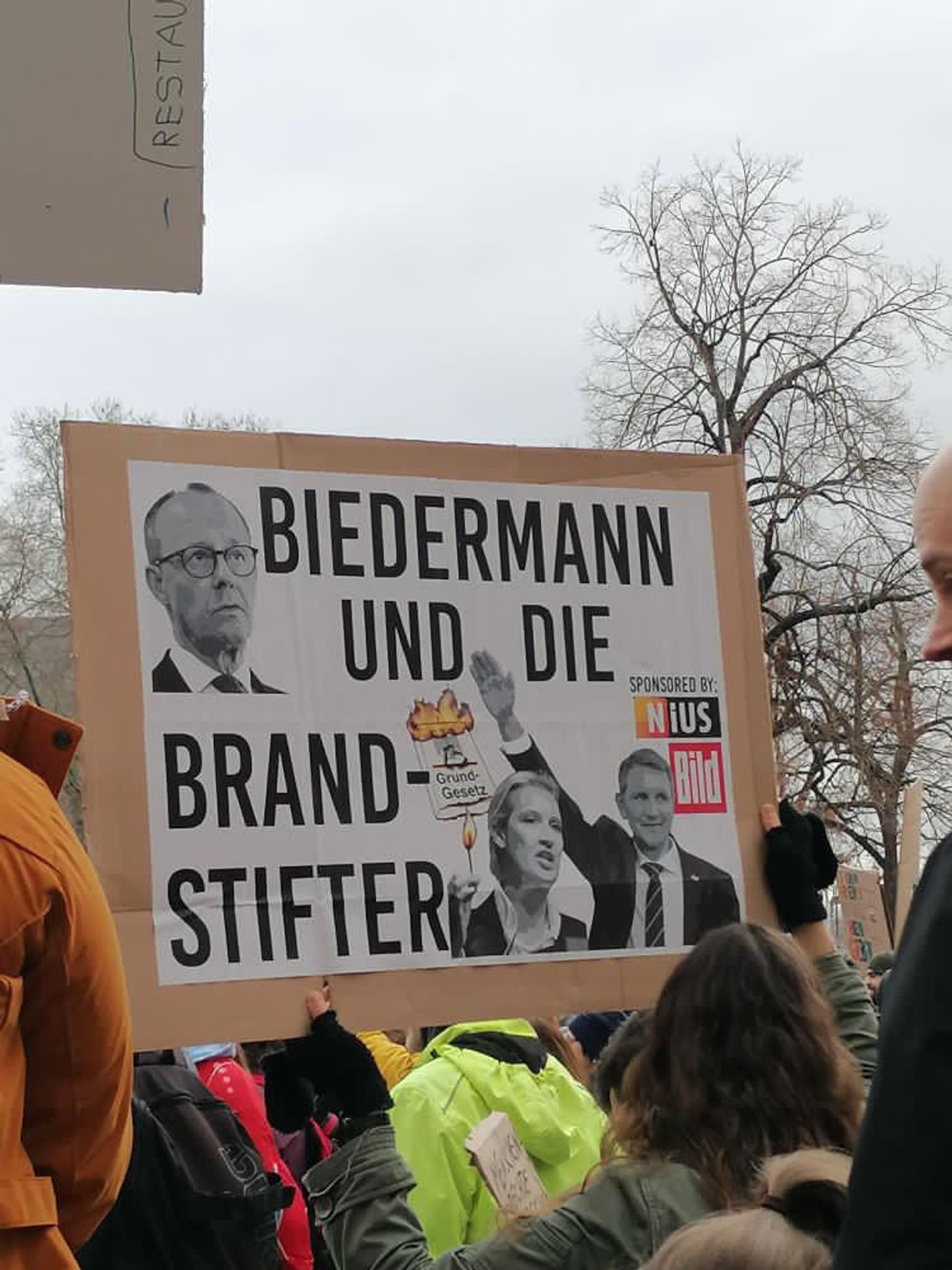 Merz als Steigbügelhalter der AfD auf einem Demoplakat