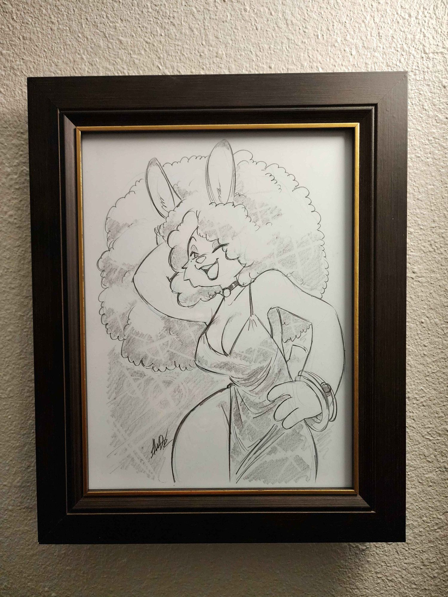 A framed sketch of an anthro rabbit woman in a cocktail dress. She has an afro and looks like she's having a great time.