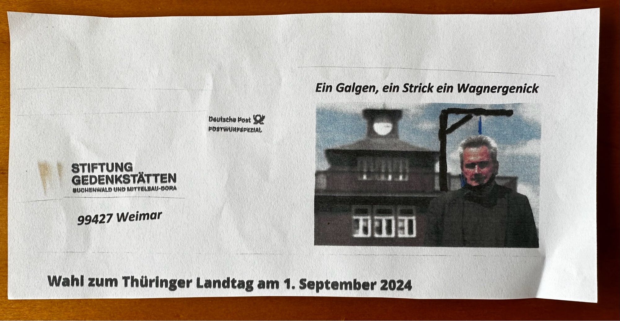 Schreiben vom 28.8.2024 mit einem mit einer Zeichnung ergänzten Foto von mir, auf dem ich am Galgen hänge. Zusätzlich der Schriftzug „Ein Galgen, ein Strick, ein Wagnergenick“.