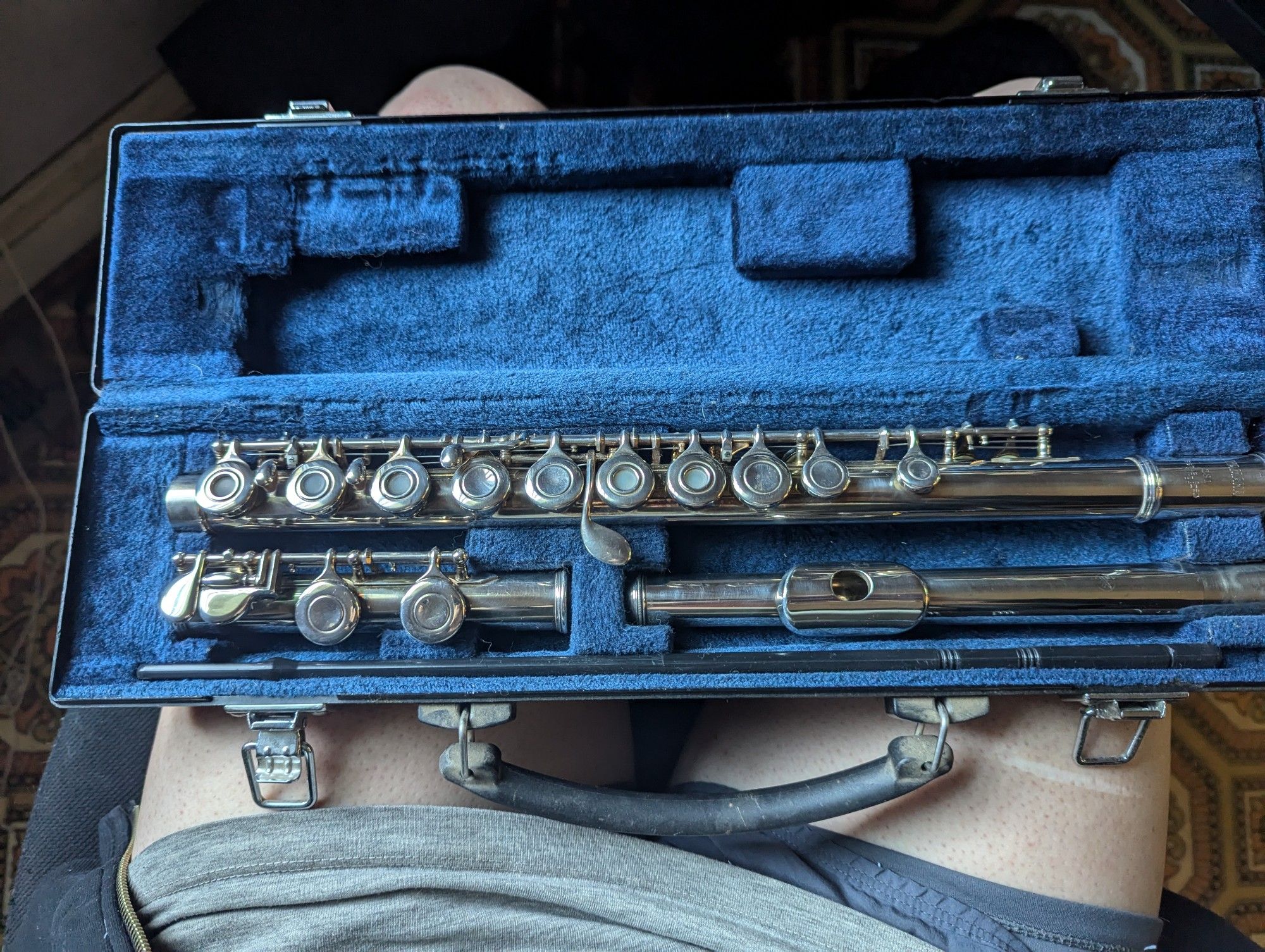 flute in blue velvet case, not shining like new but shining like a lot better than it was