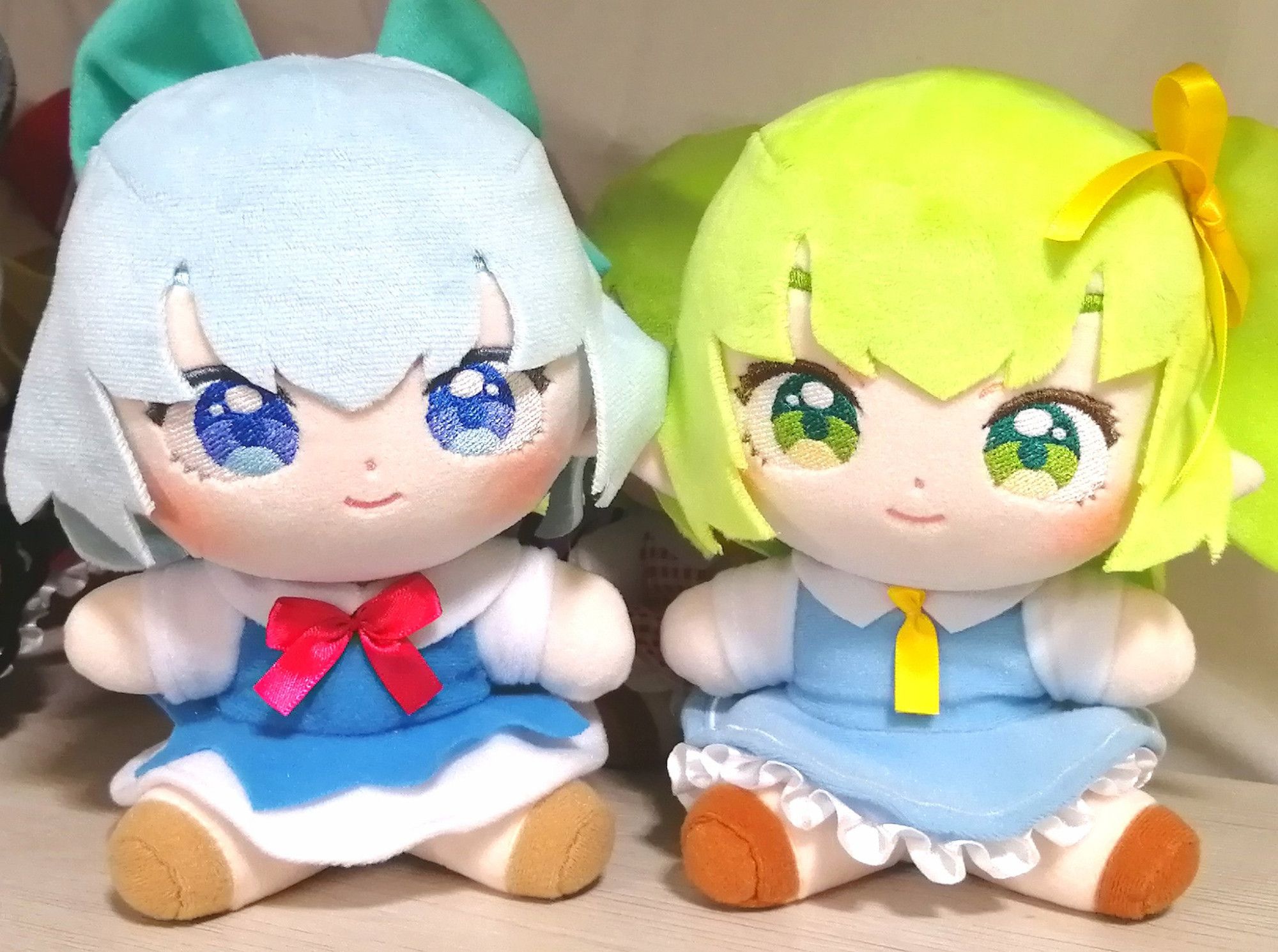 2 handmade stuffed toys of Cirno and Daiyousei from the Touhou Project franchise.