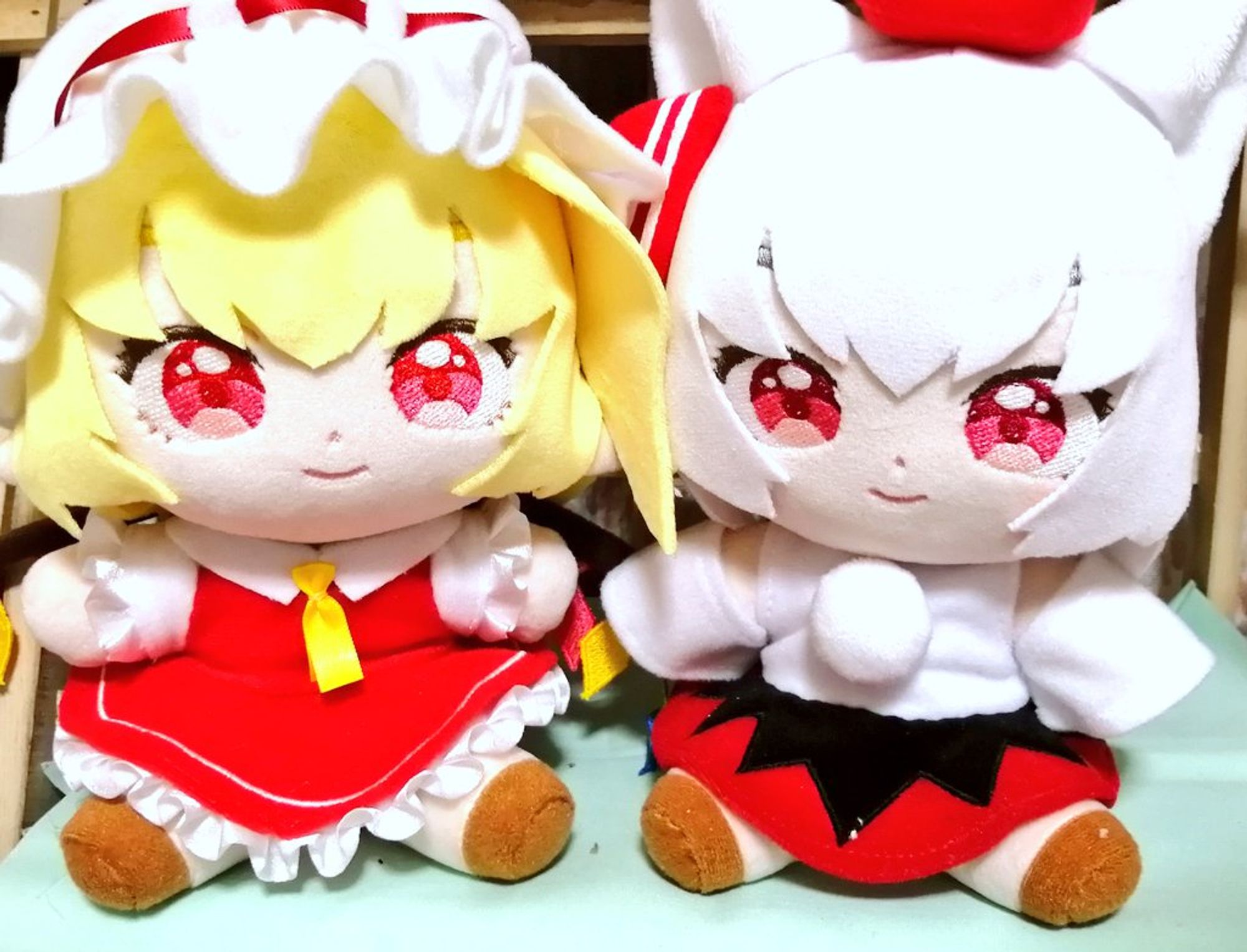 2 handmade stuffed toys of Flandre and Momiji from the Touhou Project franchise.