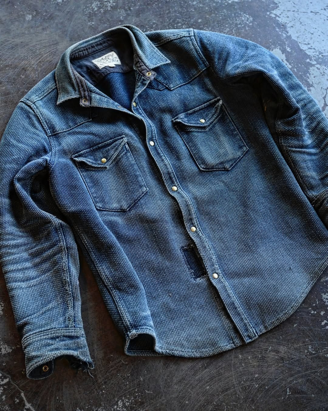An older version of the shirt owned by Ship John's owner. The fabric is much more worn in, so you can see how the material has faded. 