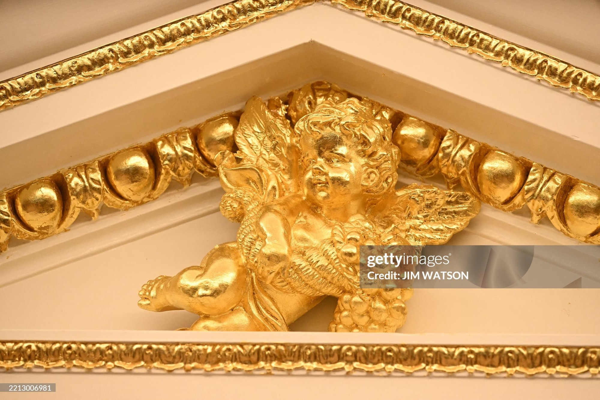 the gold detailing above the Oval Office entrance. the details are not very crisp. 