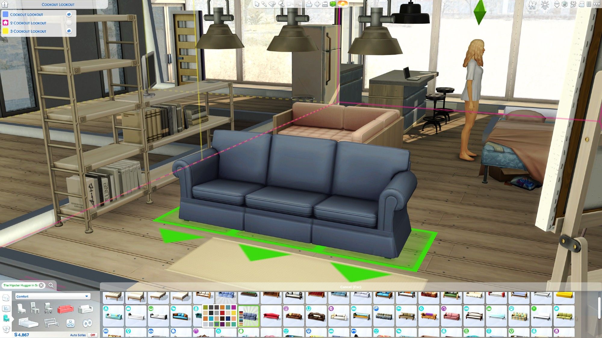 The Sims 4 buy mode catalog showing various sofa items