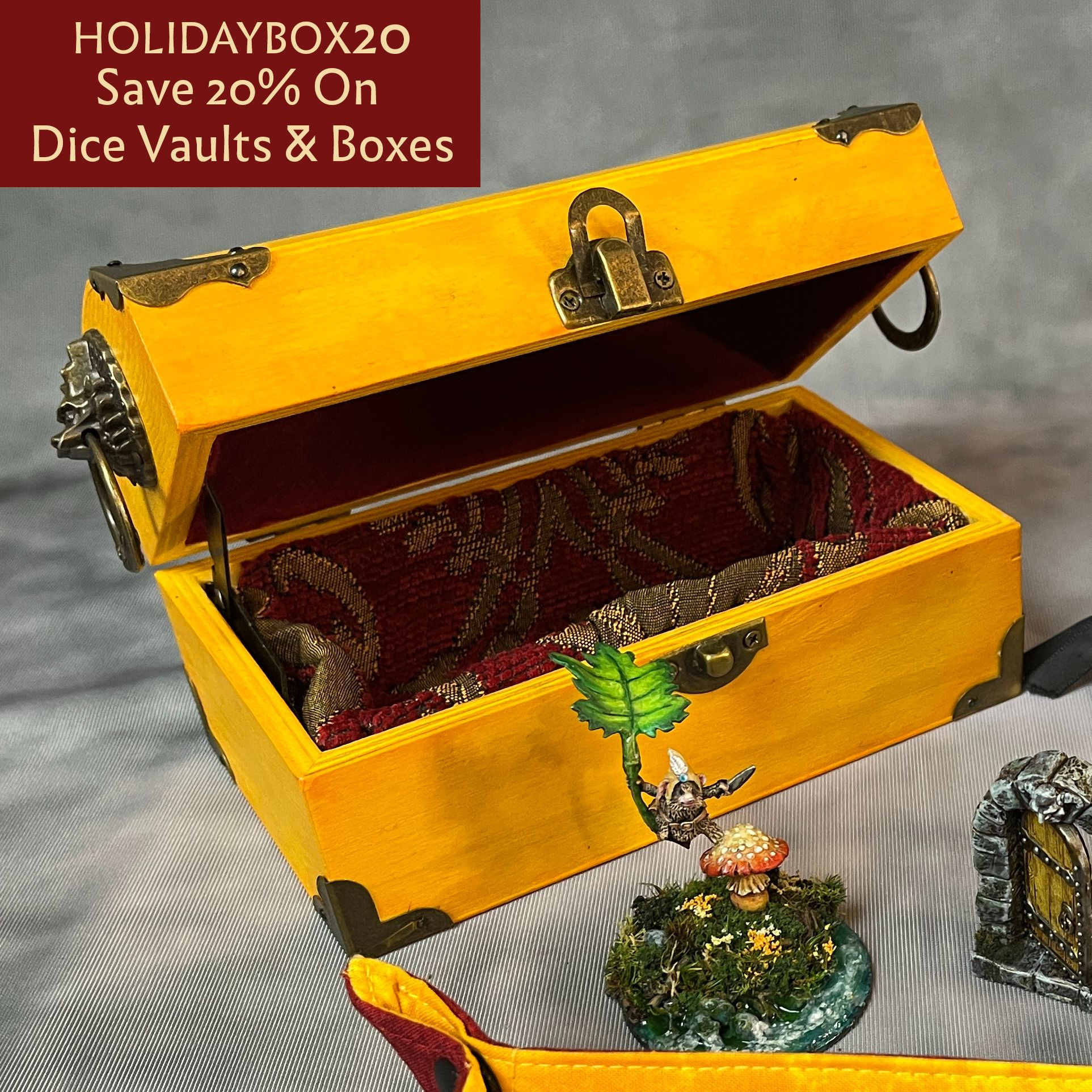 Superhero Yellow Dice vault with antique brass hardware and red & gold plush lining.