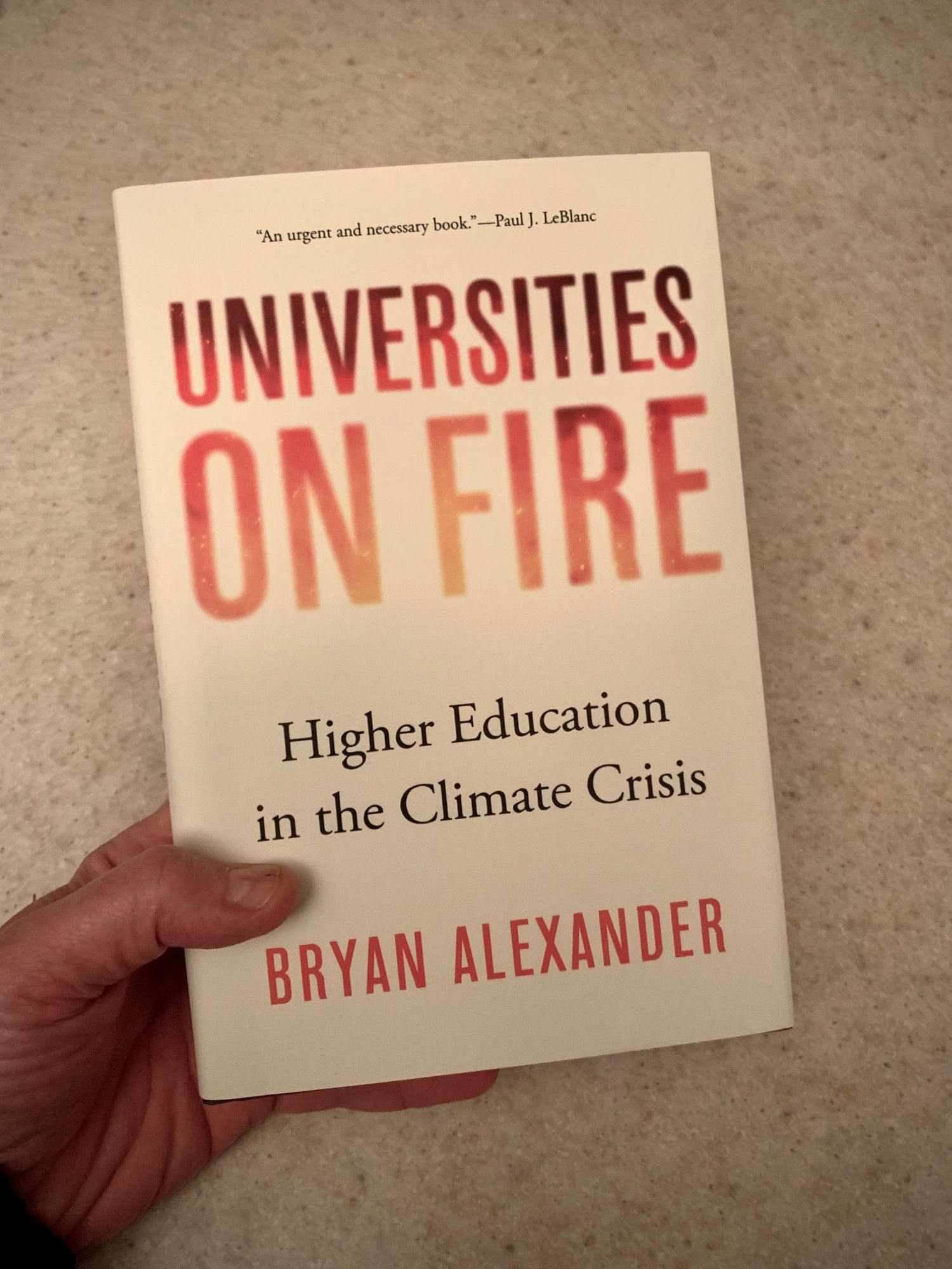 Book cover of "Universities on Fire: Higher Education in the Climate Crisis"