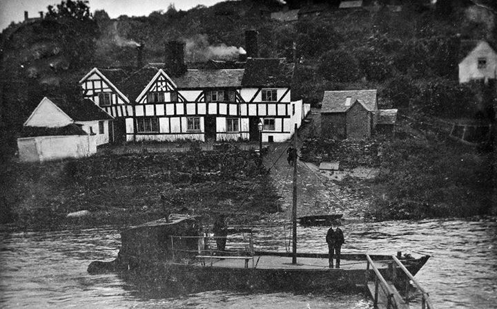 An image of one of the Coalport ferries. A black and white building is in the background